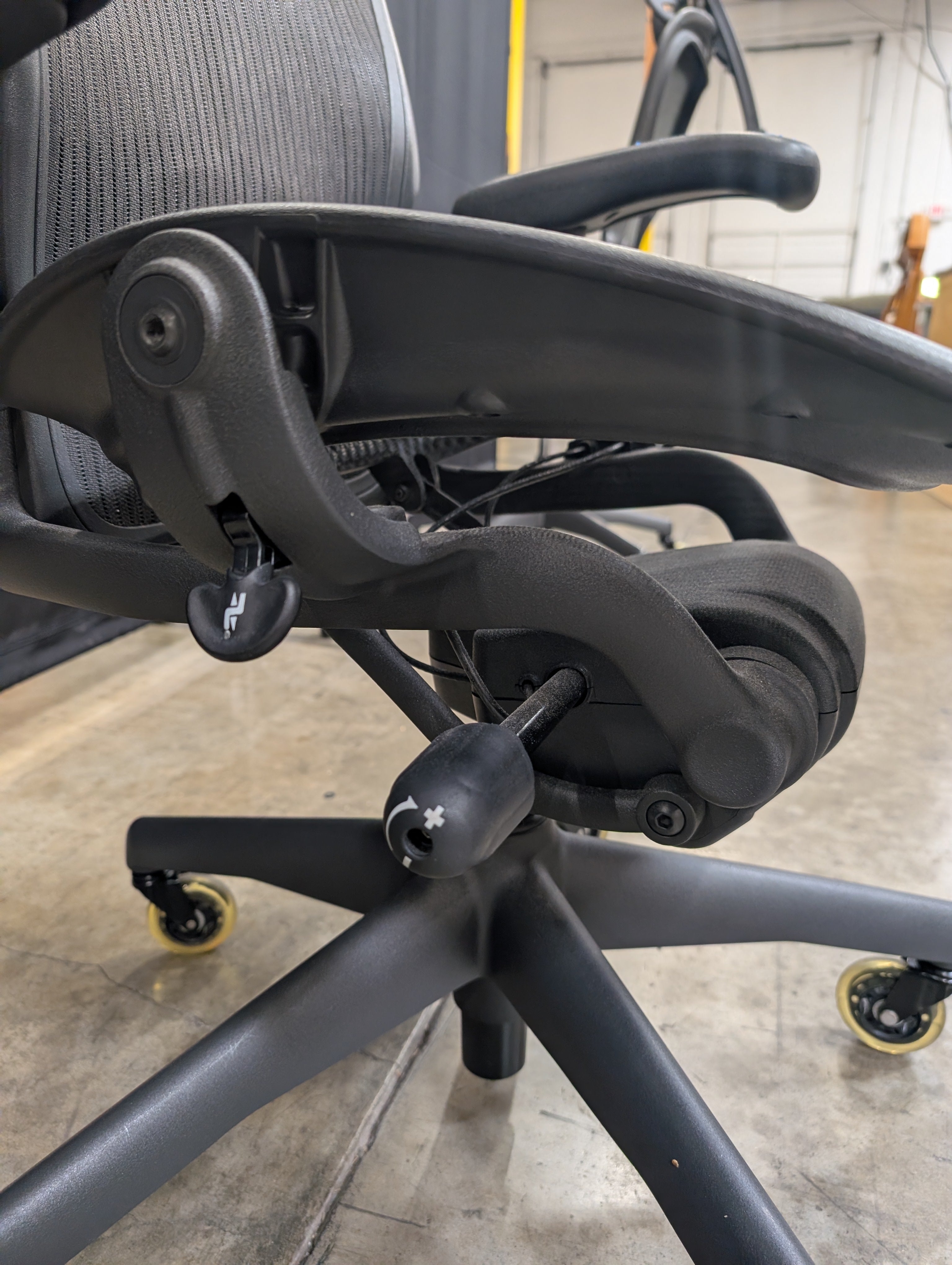 Black Mesh High-Back Herman Miller Office Chair with Headrest