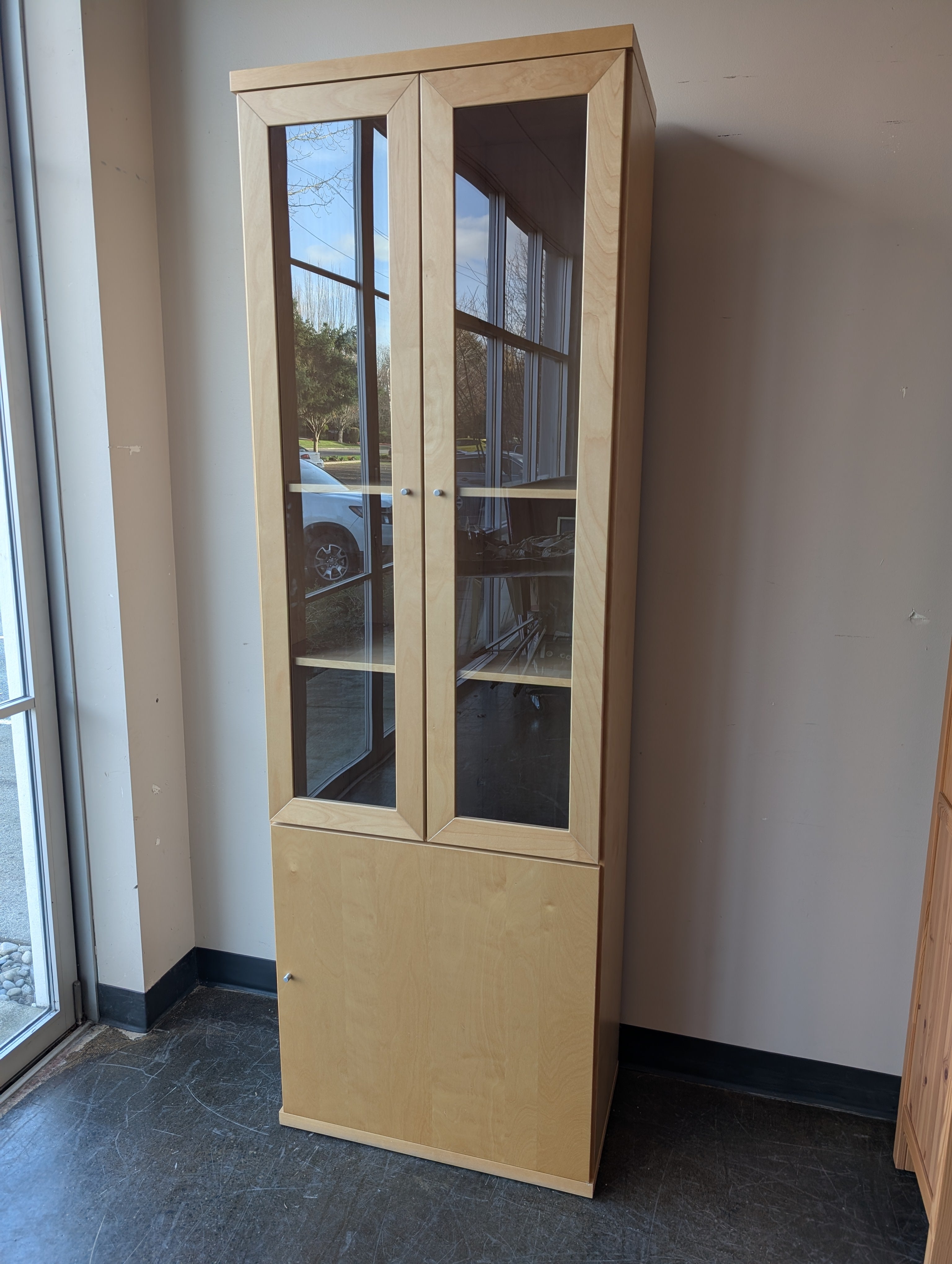 Versatile Light Wood Display and Storage Cabinet