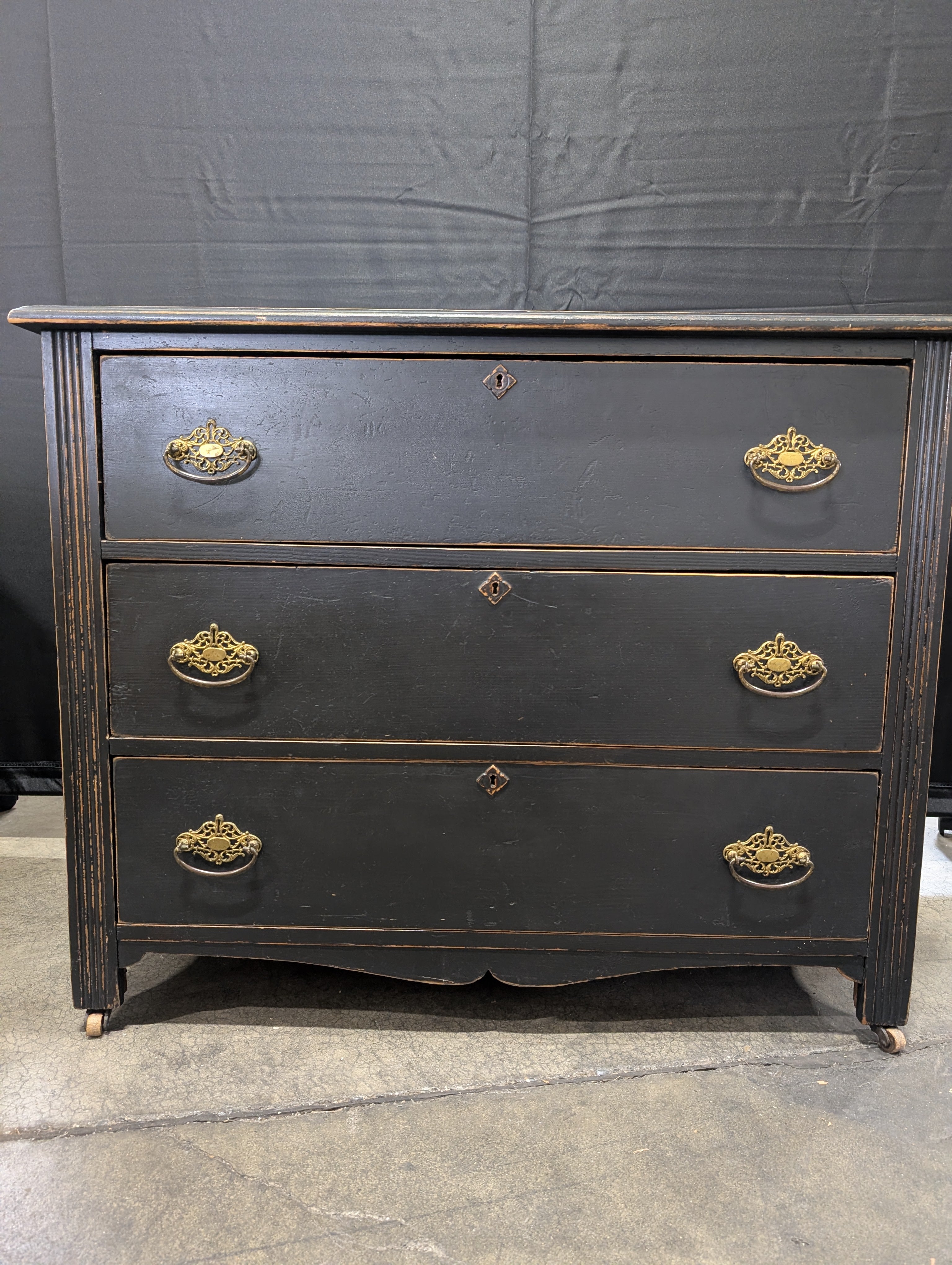 Vintage Black Wood Three-Drawer Chest with Ornate Brass Hardware
