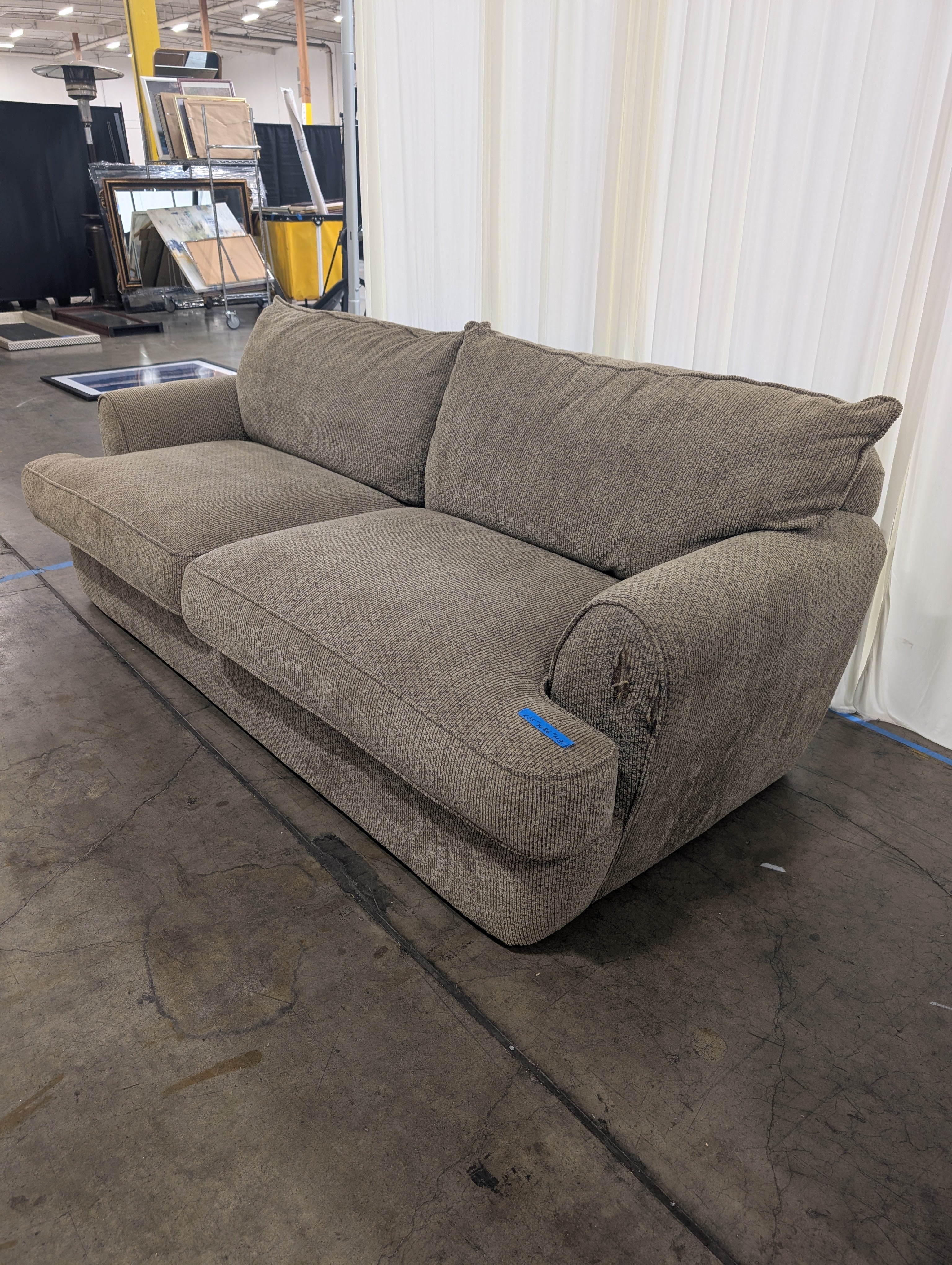 Textured Tan Fabric Two-Cushion Couch with Rolled Arms