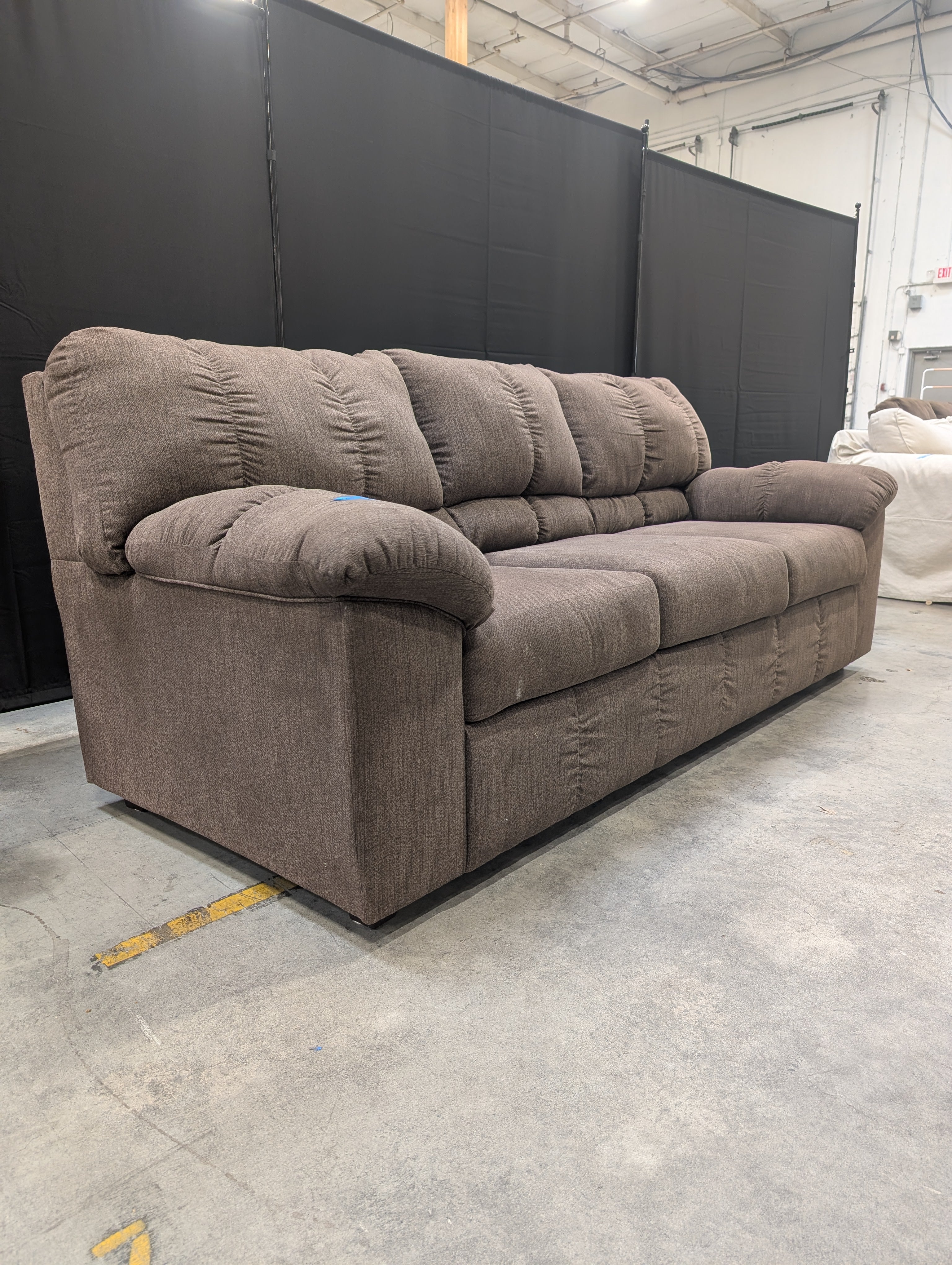 Brown Fabric Ashley Furniture Three-Seat Sofa