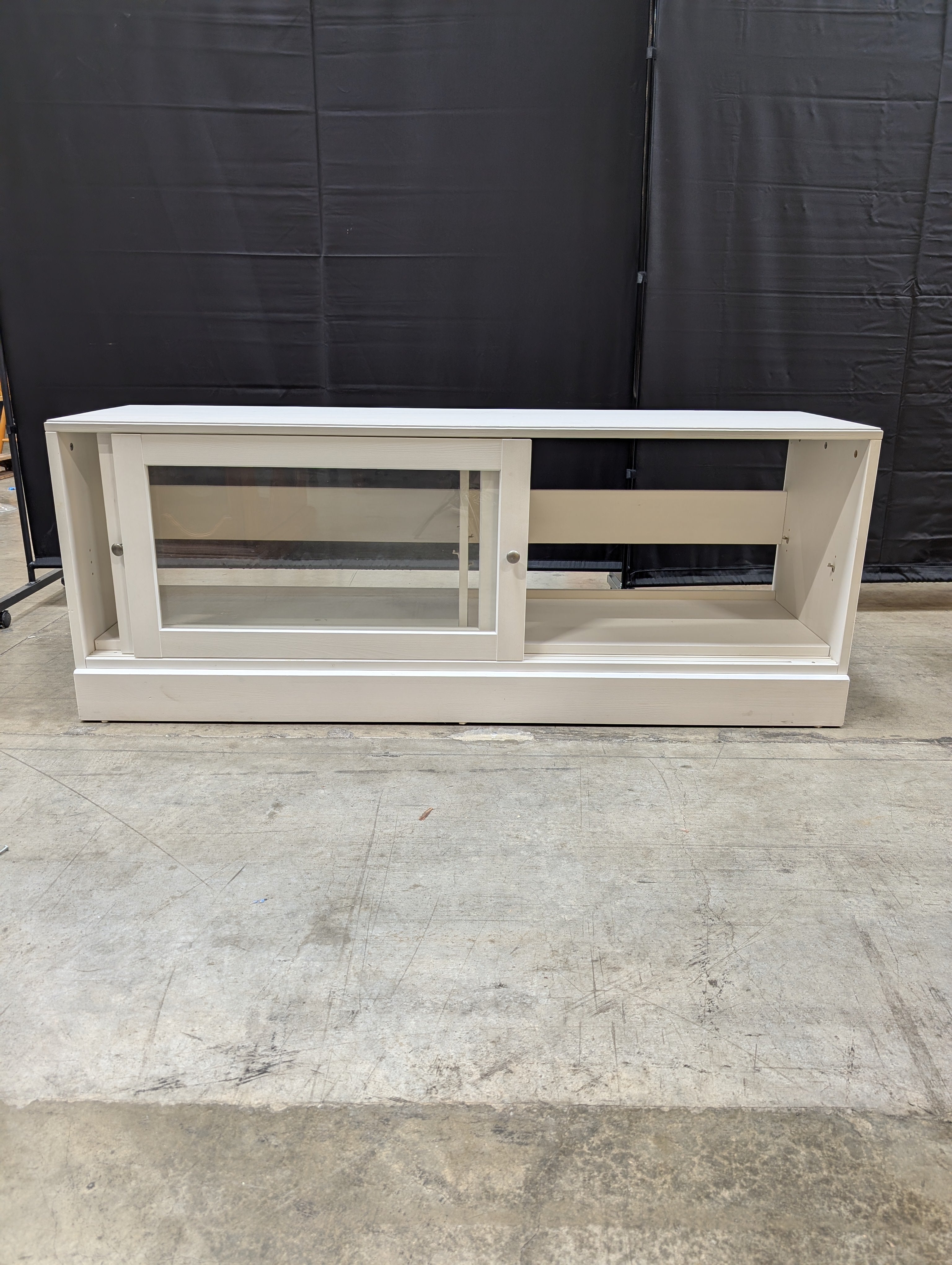 White Media Console with Sliding Glass Door