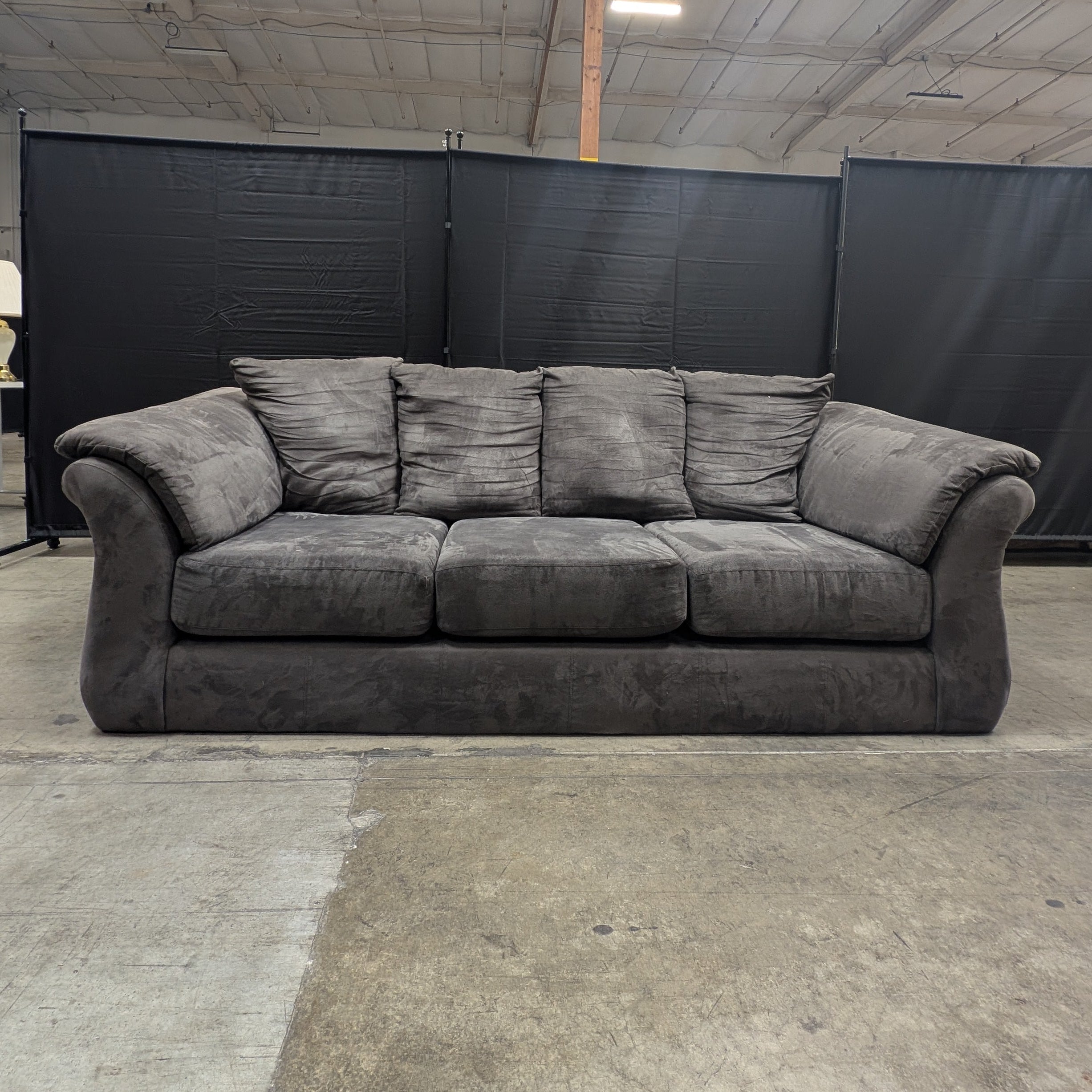 Spacious Three-Seater Grey Upholstered Sofa