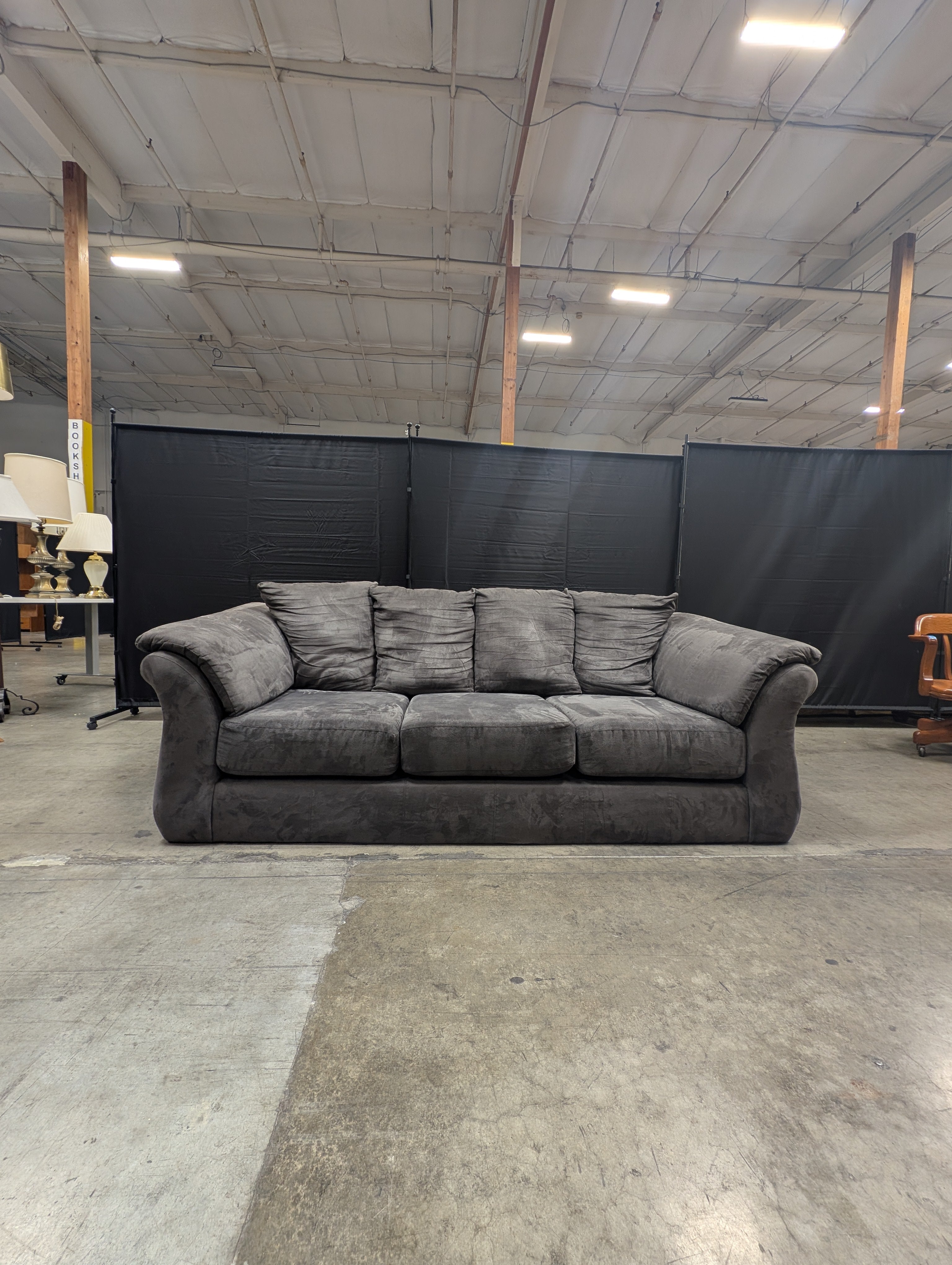 Spacious Three-Seater Grey Upholstered Sofa