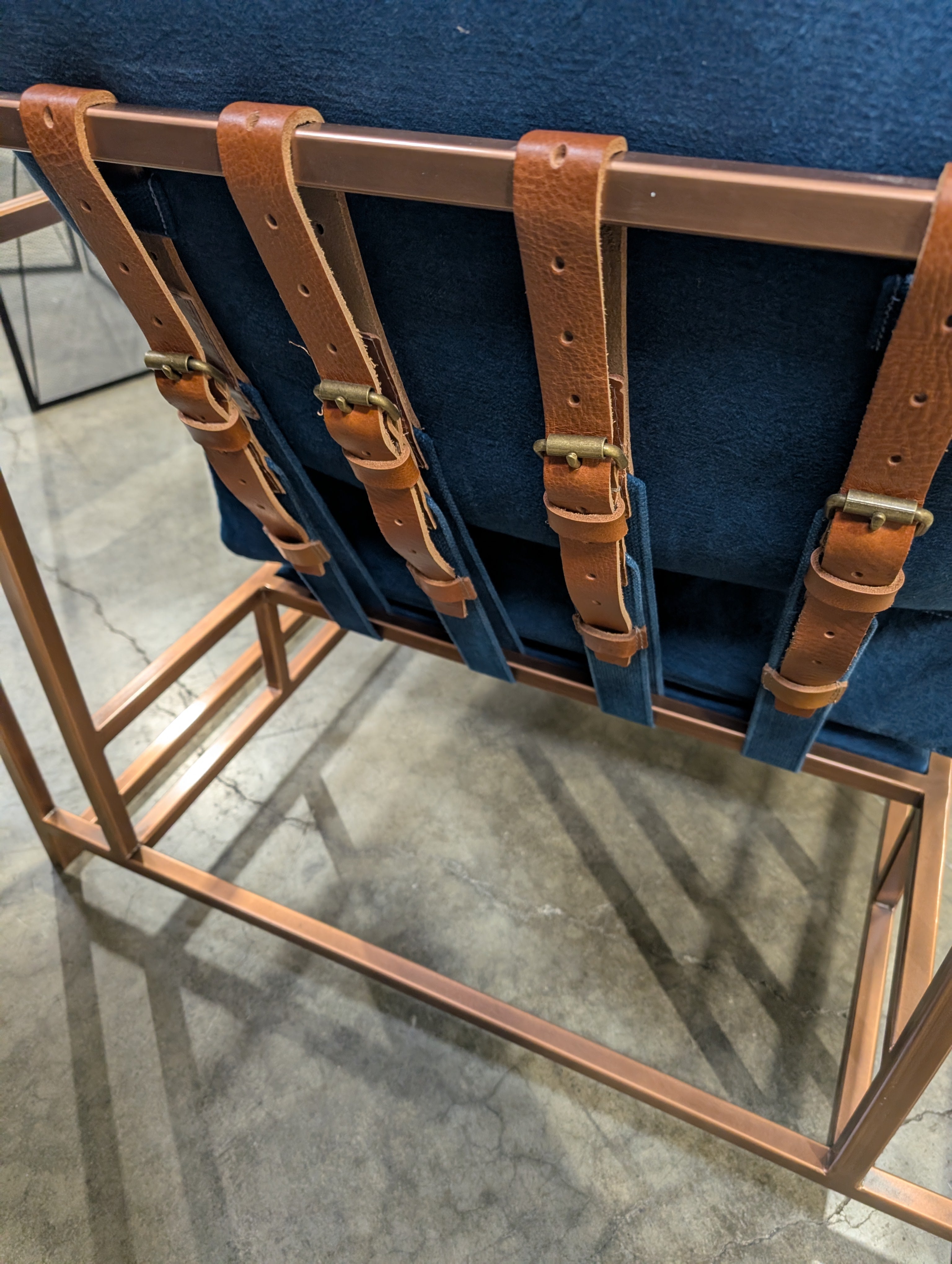Contemporary Metal Frame Armchair with Deep Blue Cushions