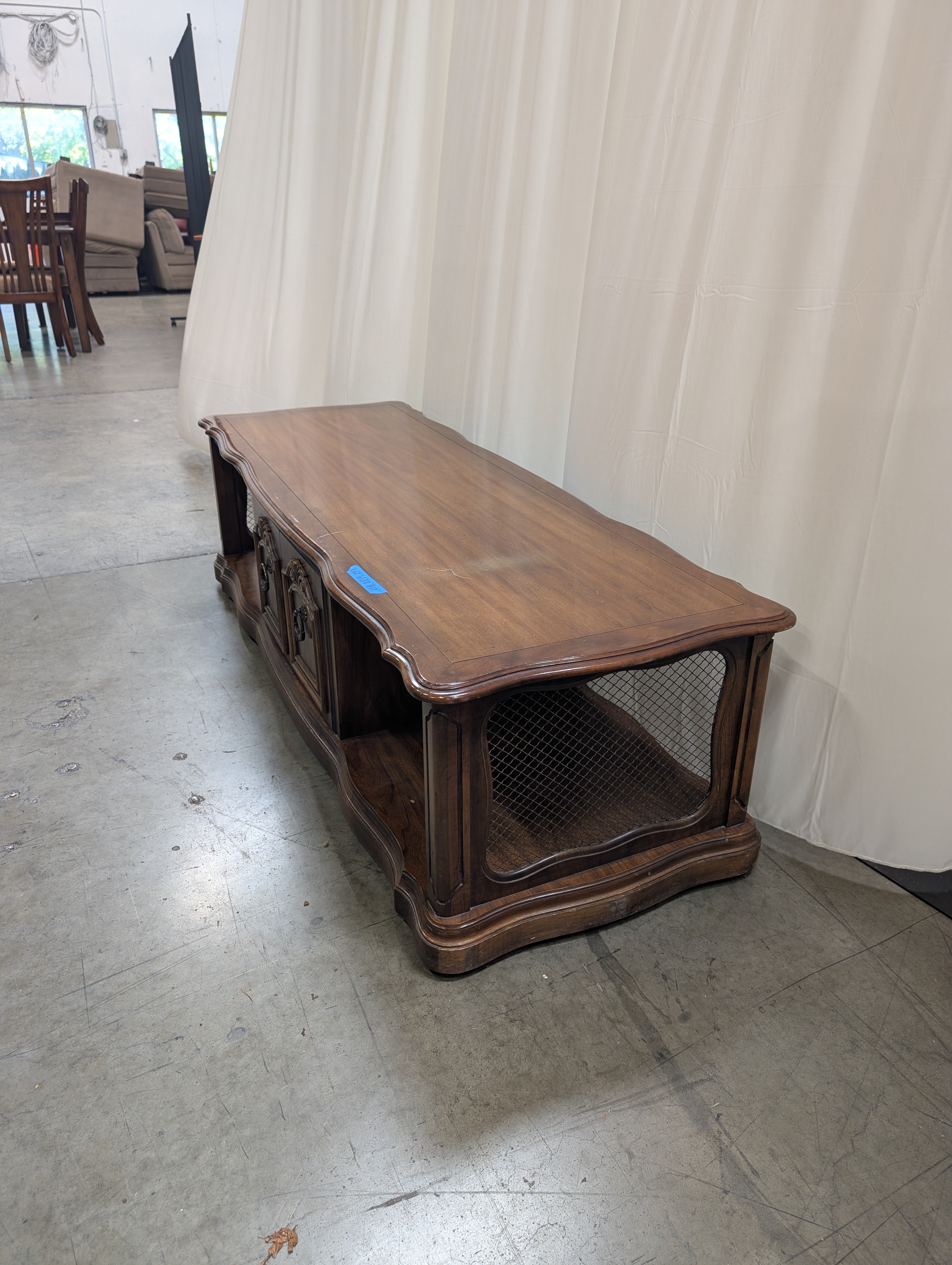 Traditional Dark Wood Coffee Table with Ornate Hardware
