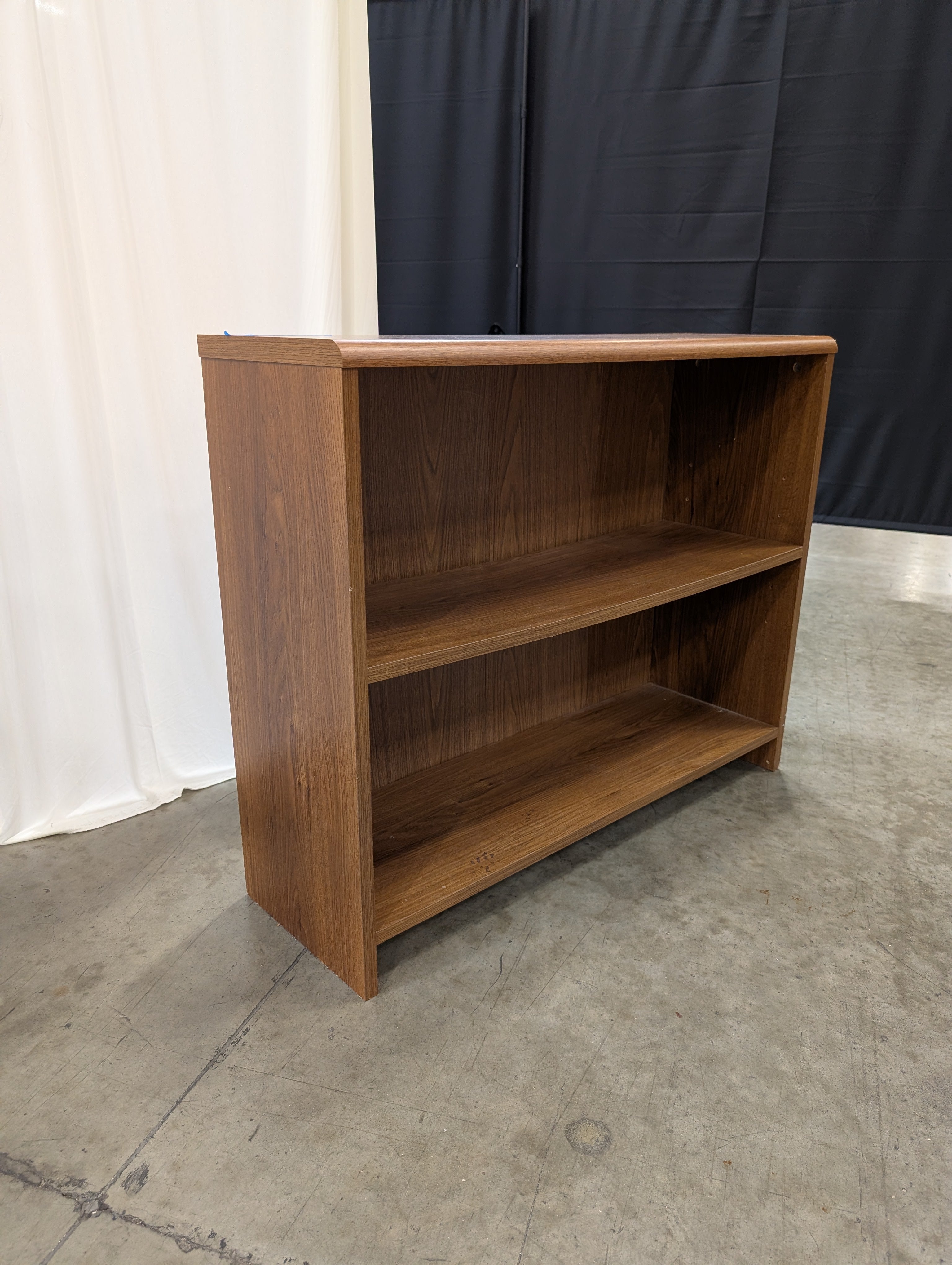 Compact Two-Shelf Wood-Toned Bookcase