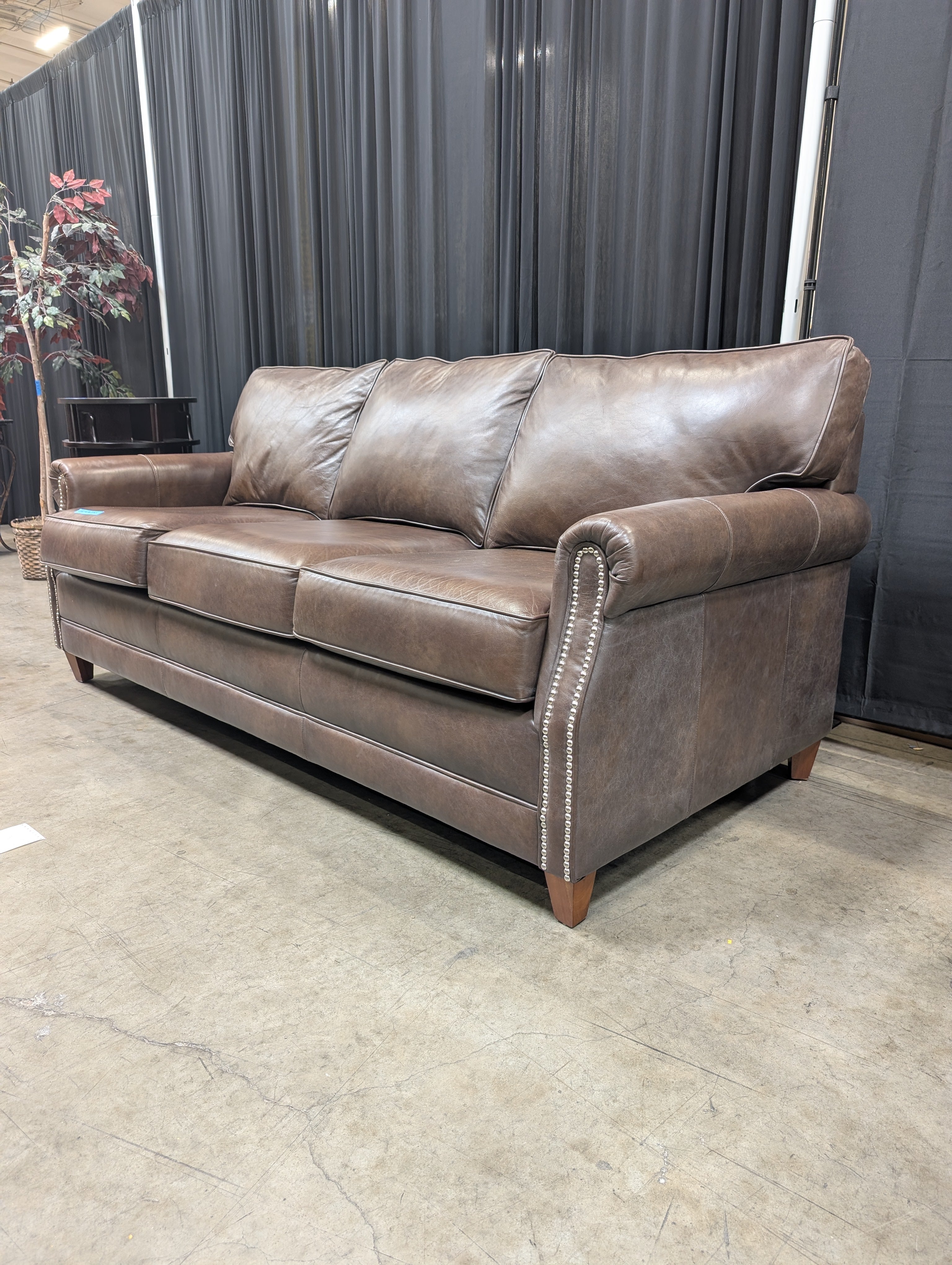 Brown Leather Three-Seat Couch with Nailhead Trim