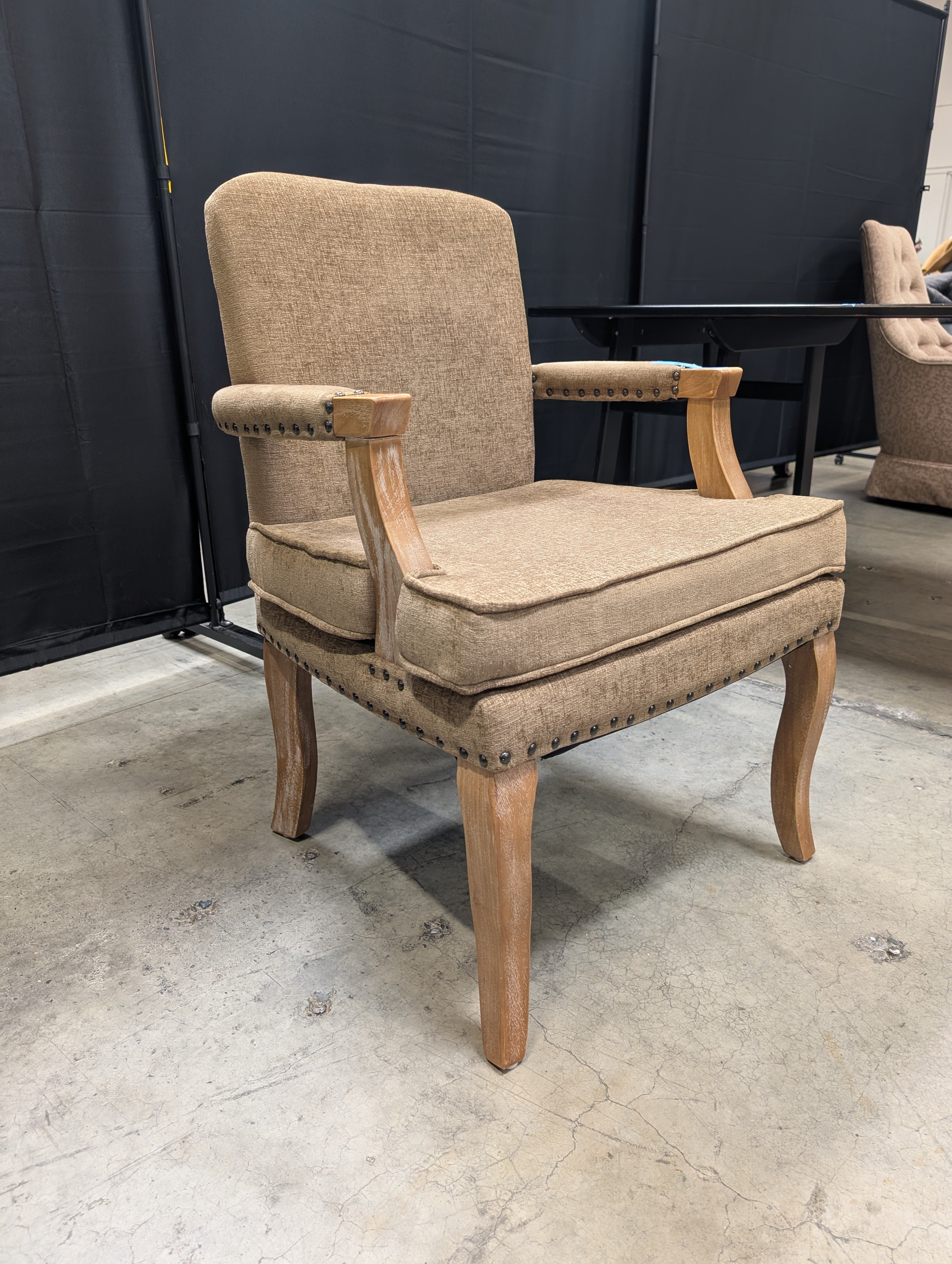 Traditional Upholstered Armchair with Carved Wood Accents