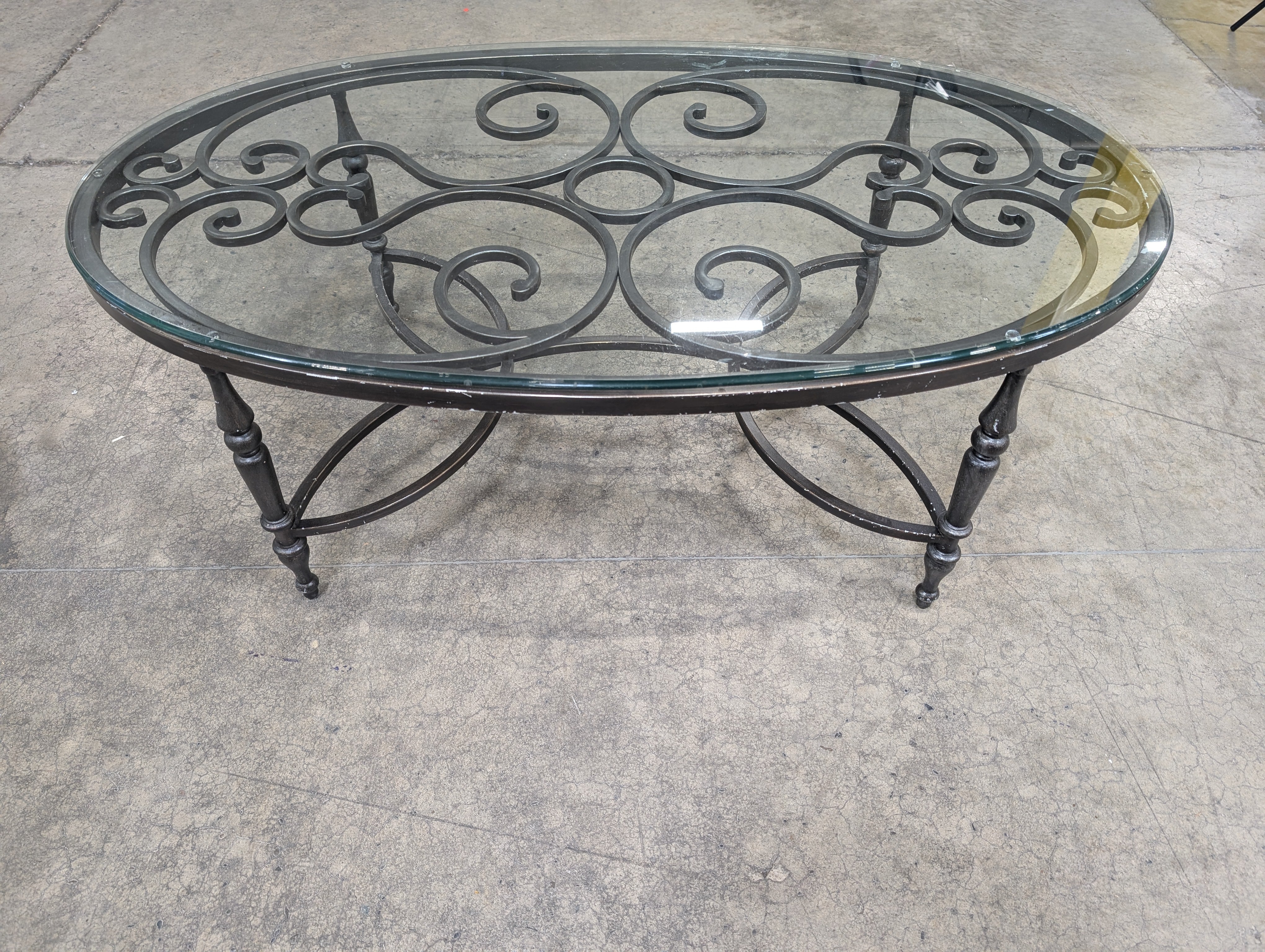 Ornate Scrollwork Metal and Glass Oval Coffee Table