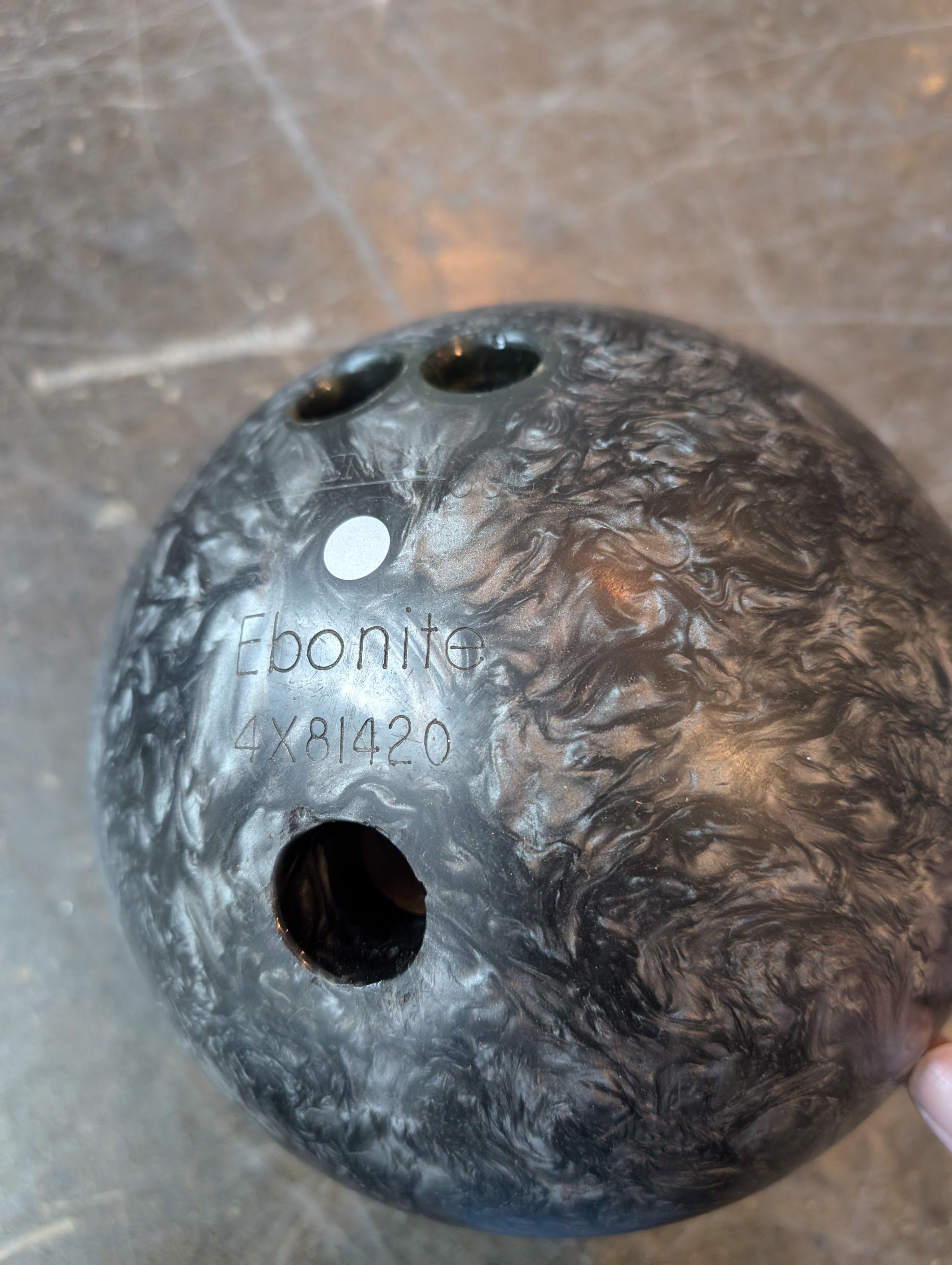Ebonite Bowling Ball with Textured Brown Carry Bag
