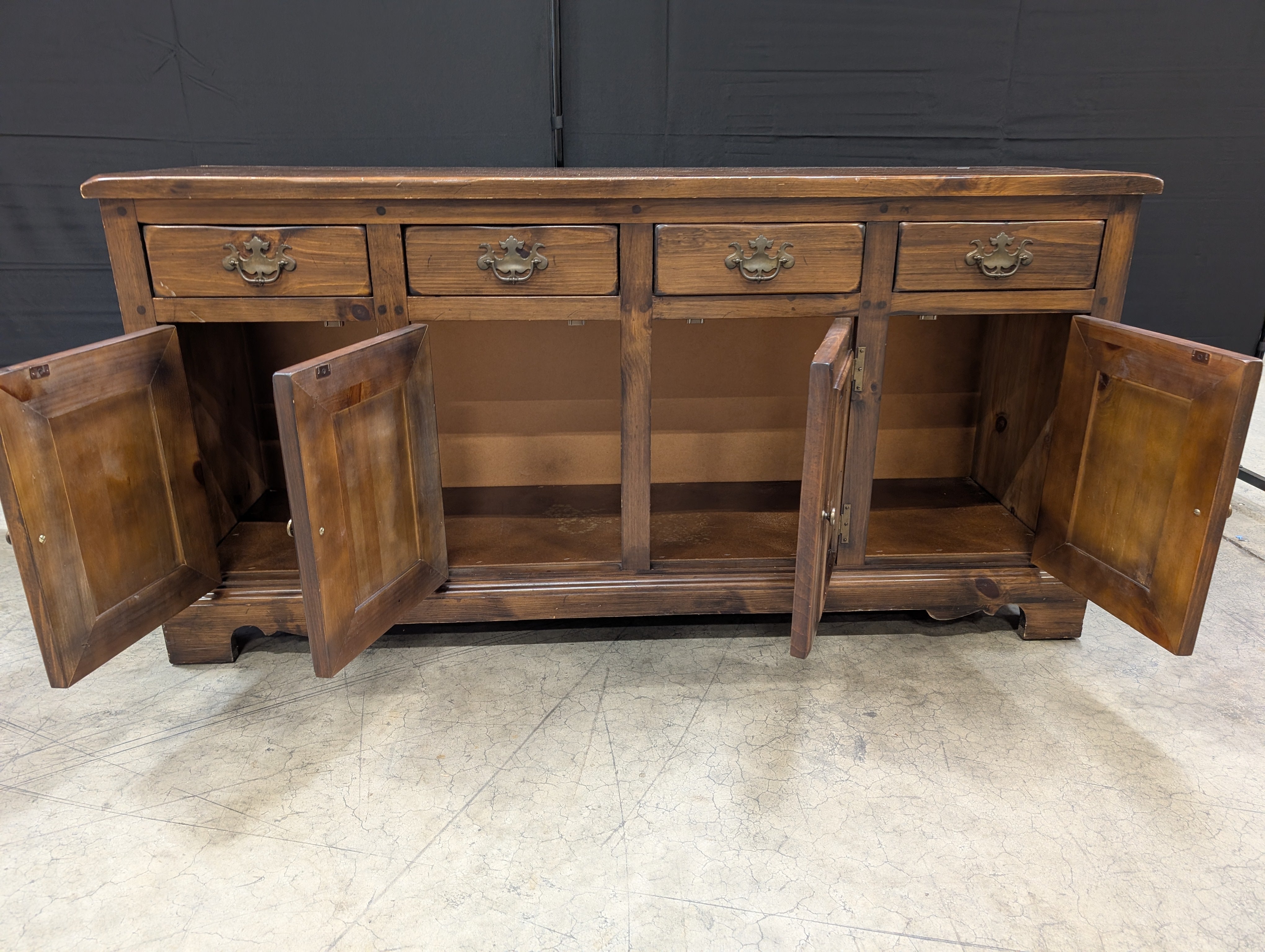 Rustic Dark Stained Wood Sideboard with Ornate Hardware
