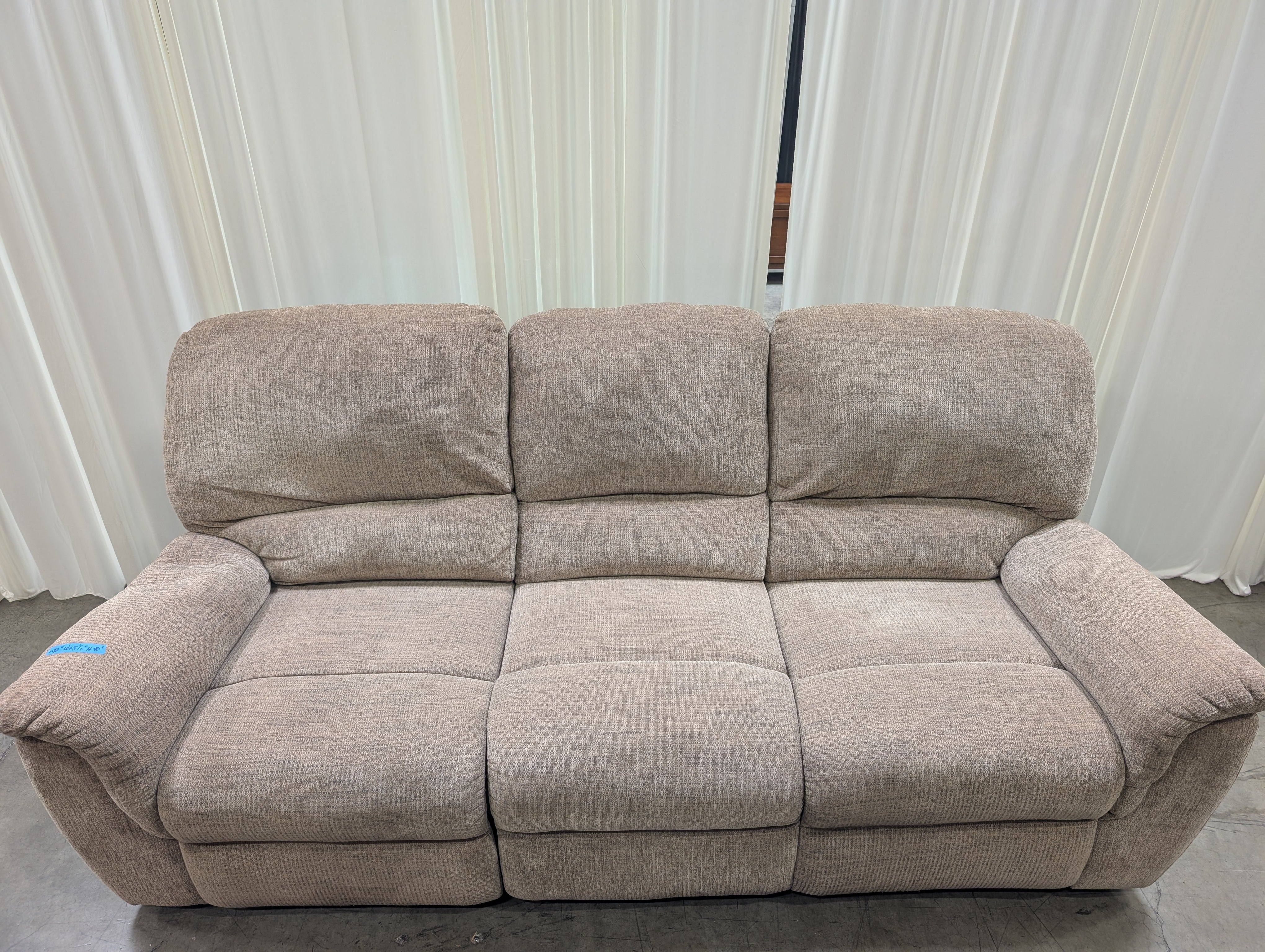 Tan Textured Fabric Reclining Couch