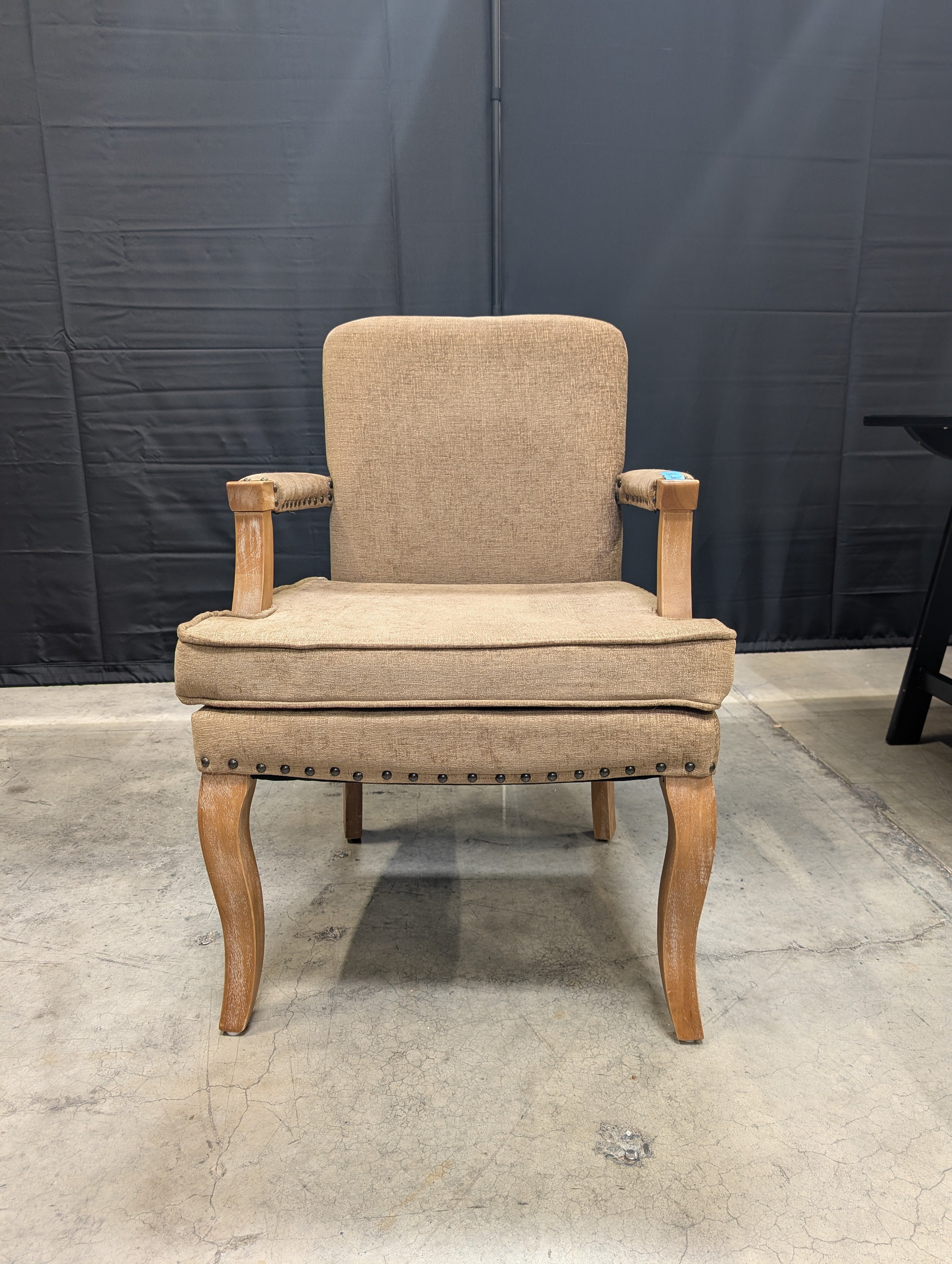 Traditional Upholstered Armchair with Carved Wood Accents