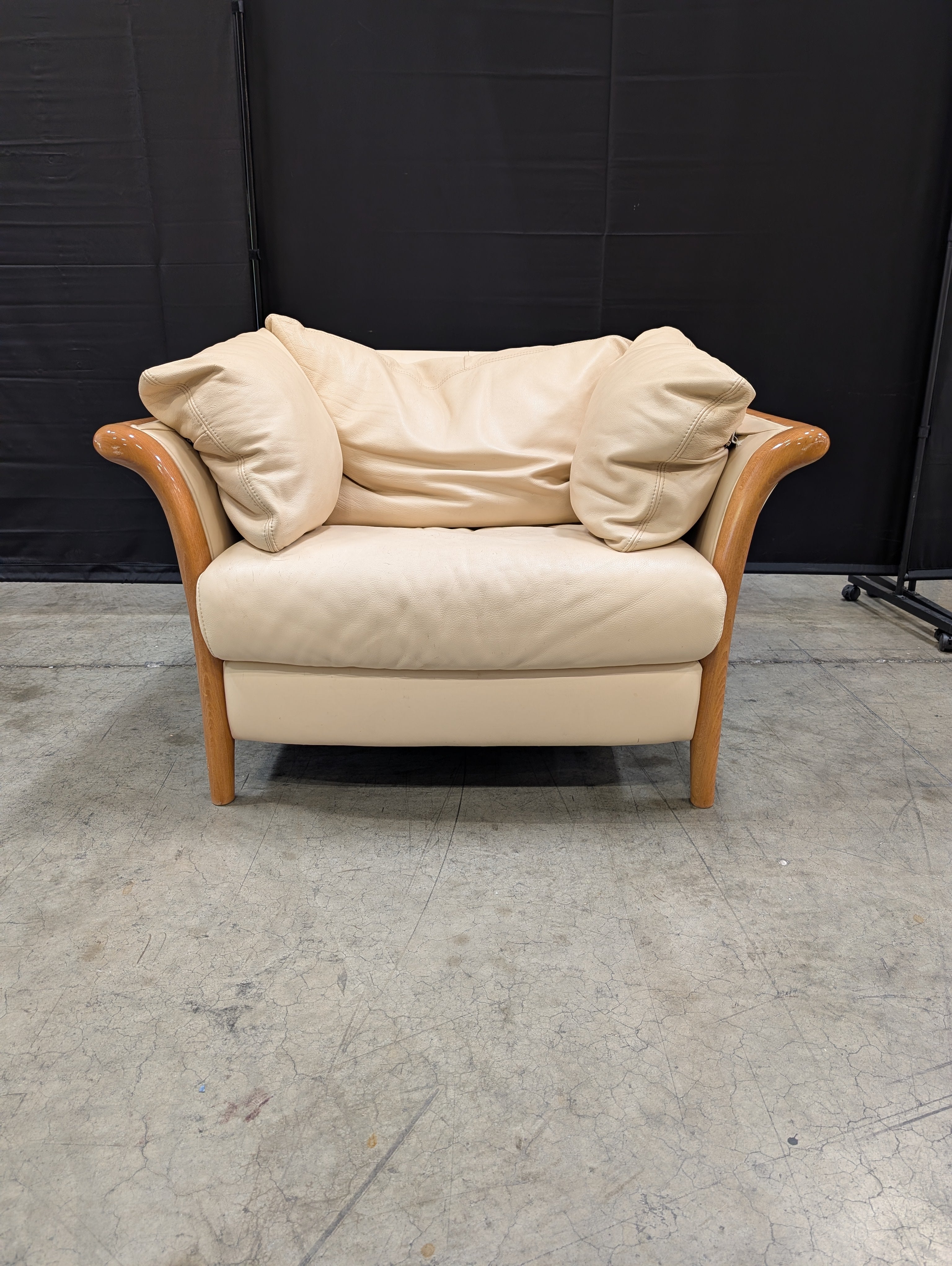 Beige leather Chair with Exposed Wood Frame