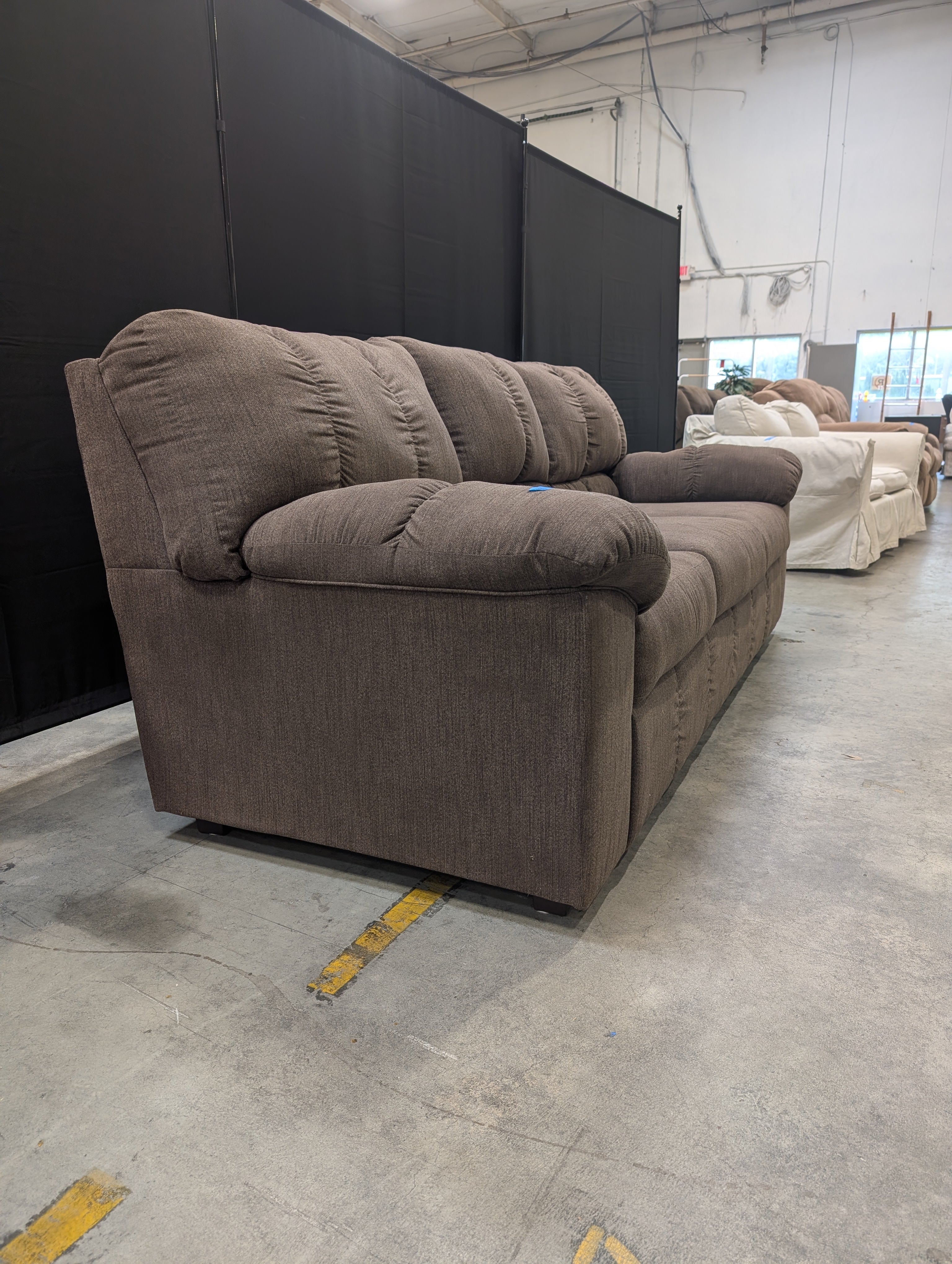 Brown Fabric Ashley Furniture Three-Seat Sofa