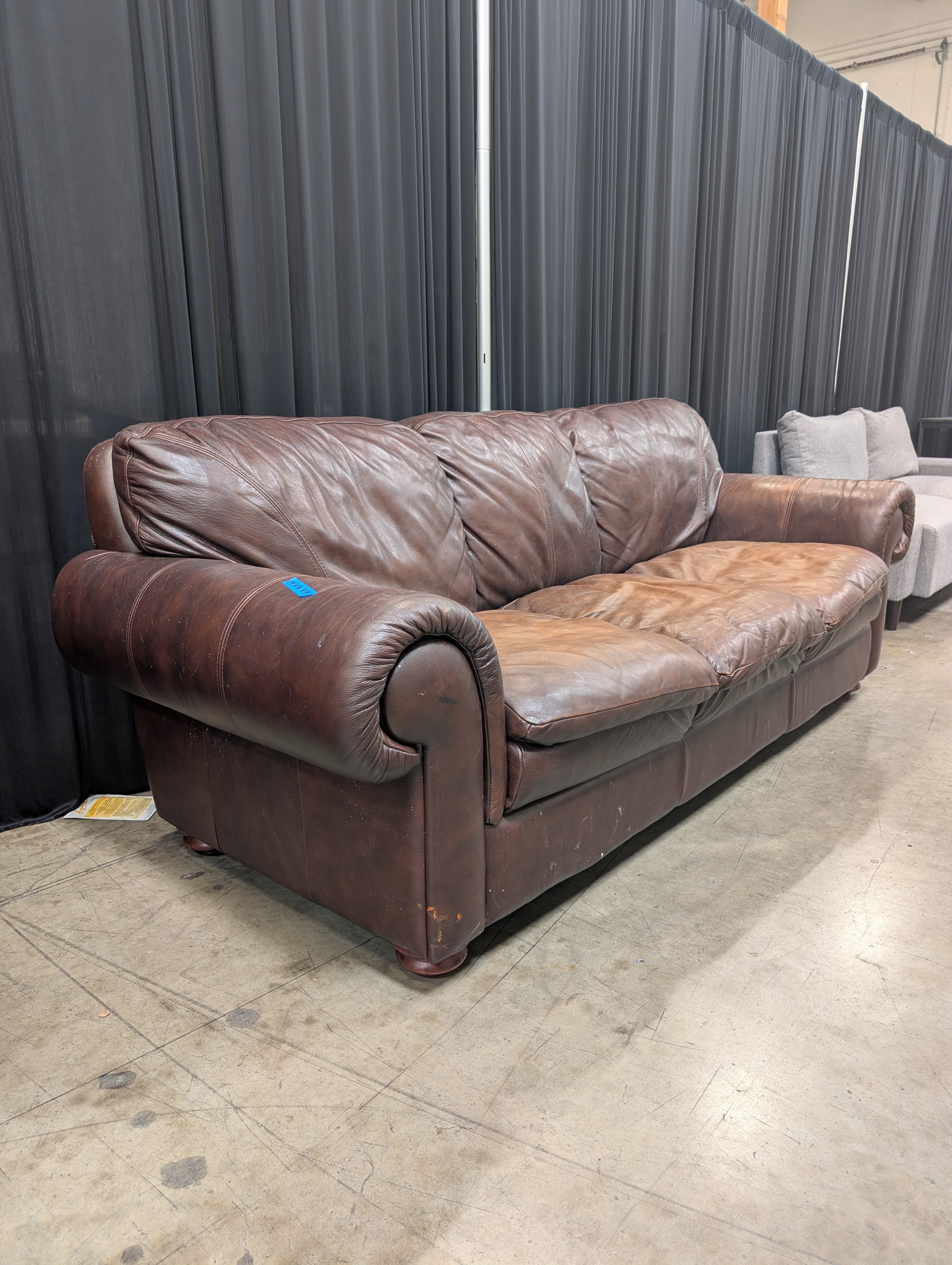 Brown Leather Three-Cushion Couch