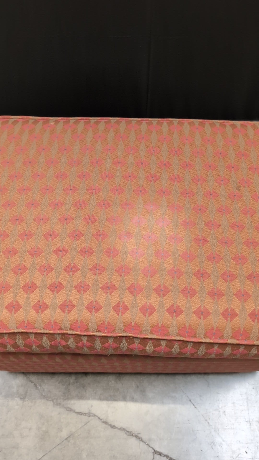 Vibrant Geometric Patterned Upholstered Ottoman with Wooden Furniture Risers