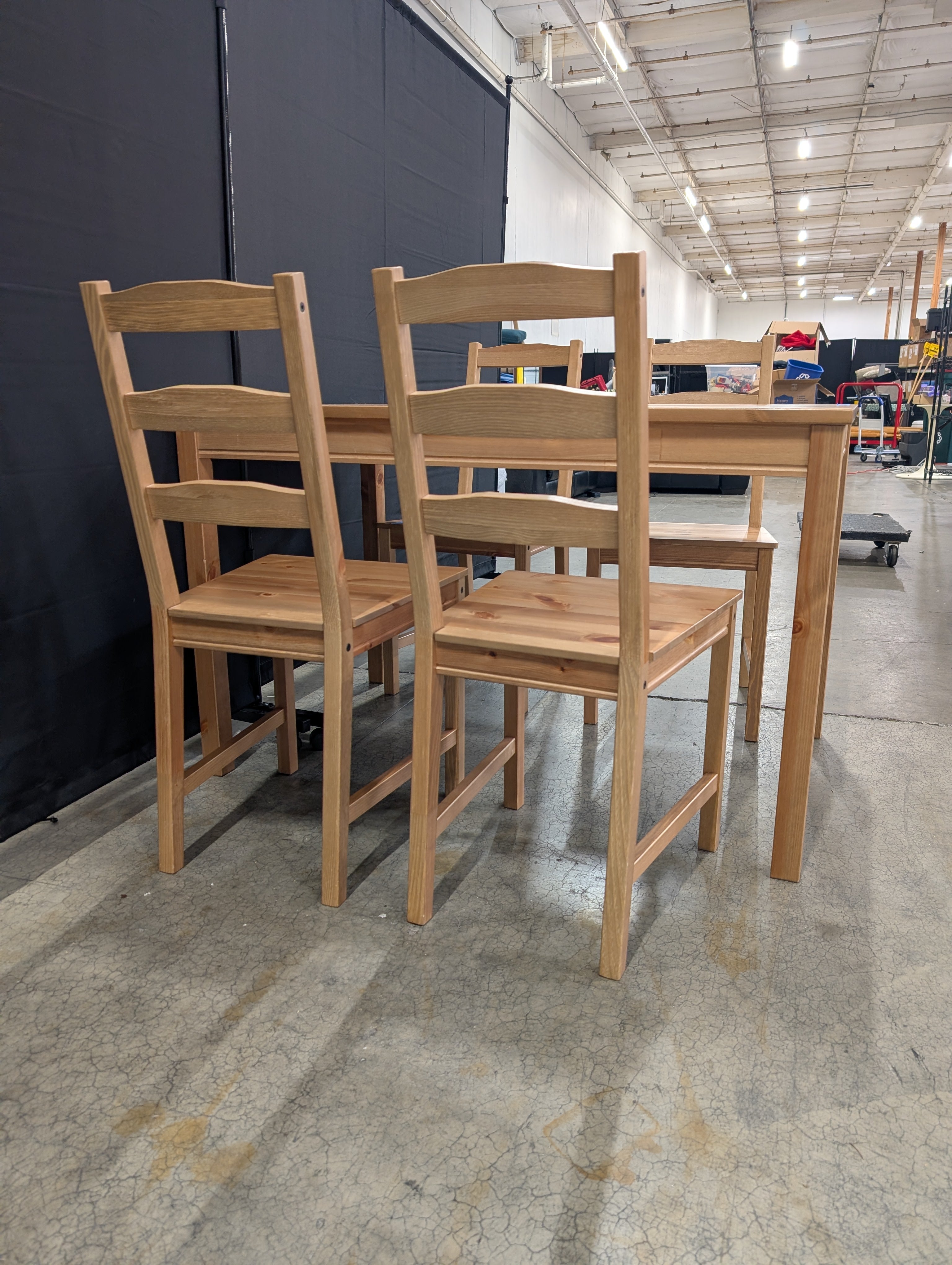 Natural Wood Plank Dining Table with Four Ladder Back Chairs
