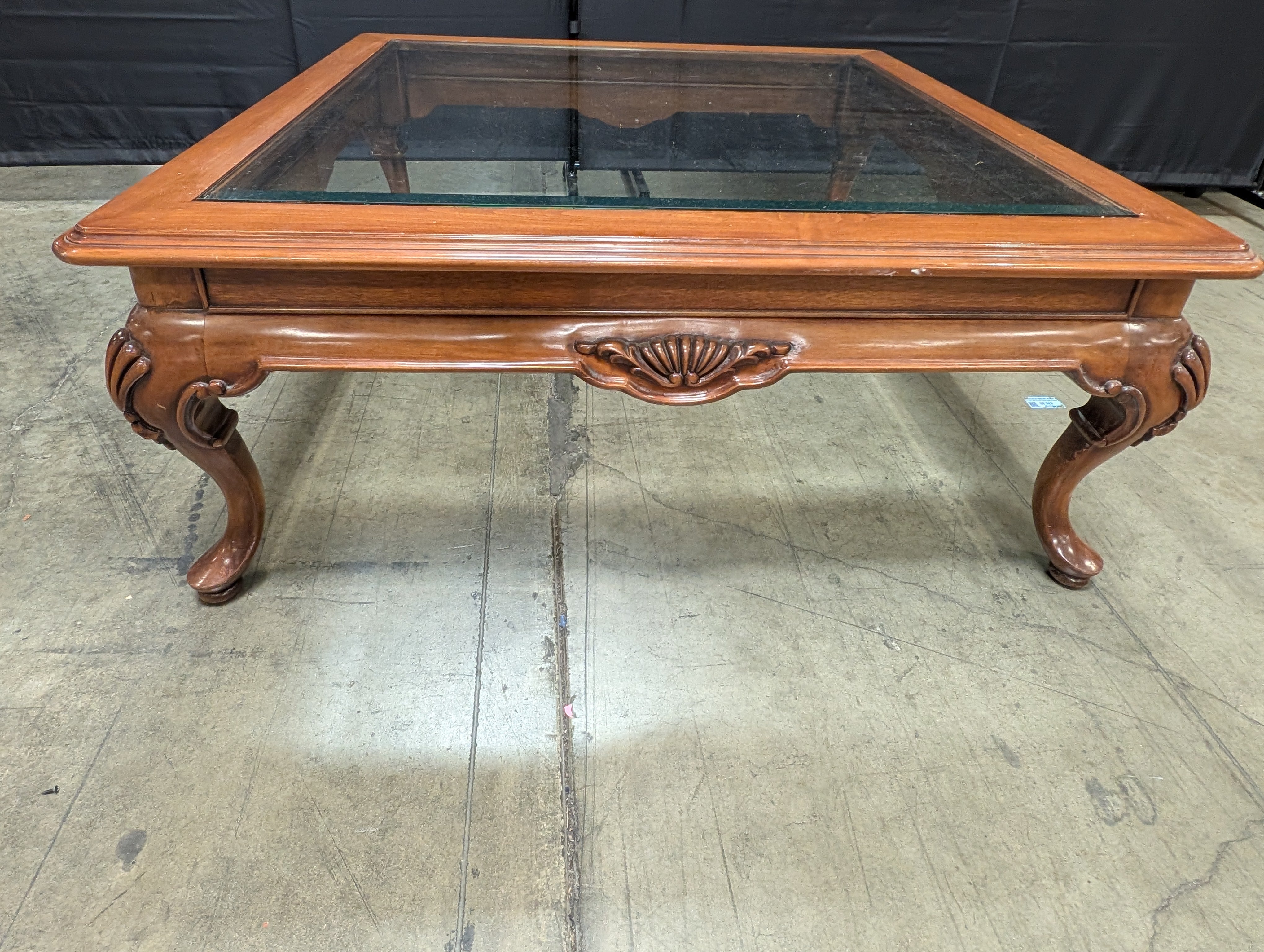 Traditional Carved Wood and Glass Top Coffee Table