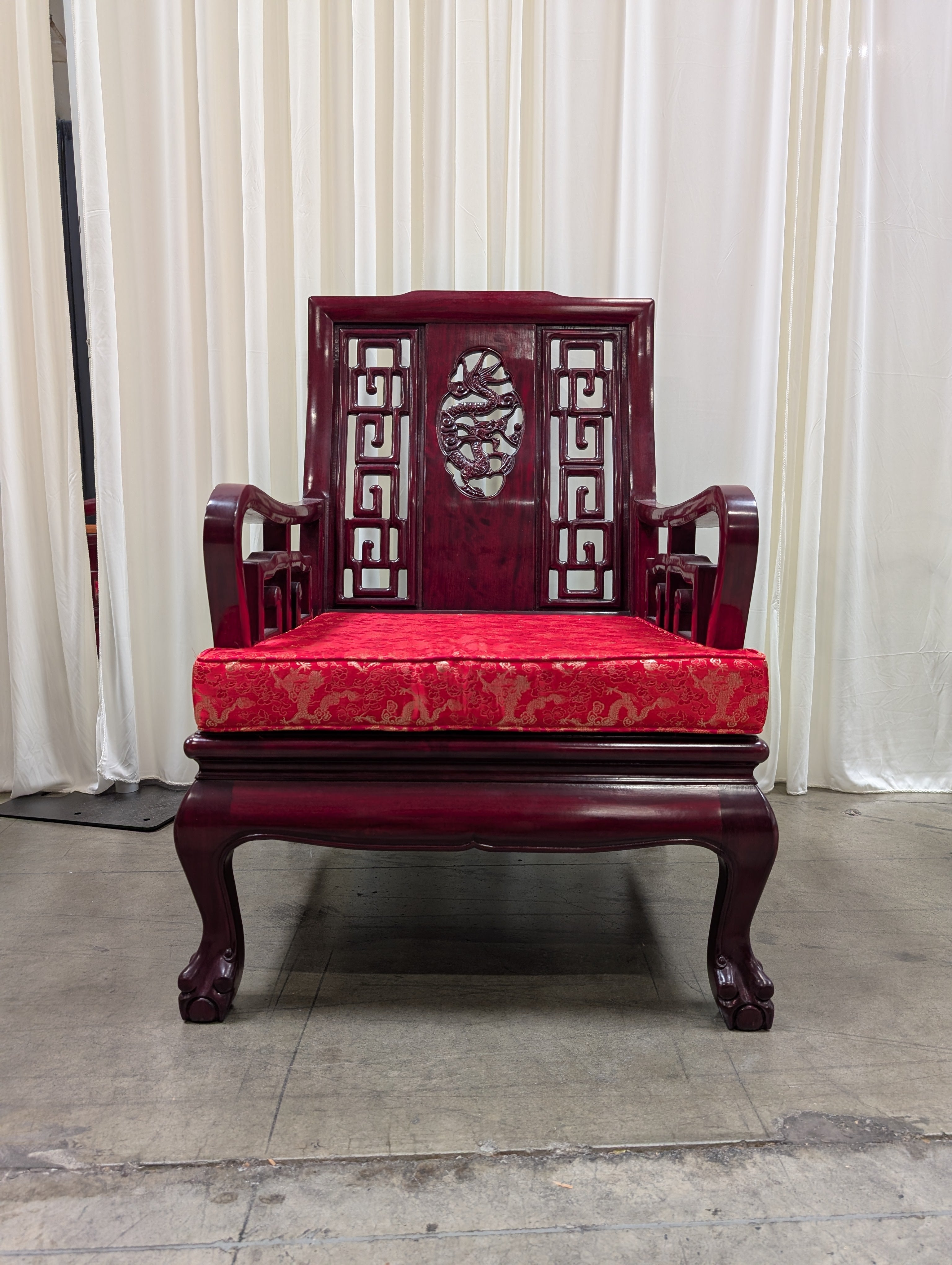 Dark Wood Carved Arm Chair with Red Cushion
