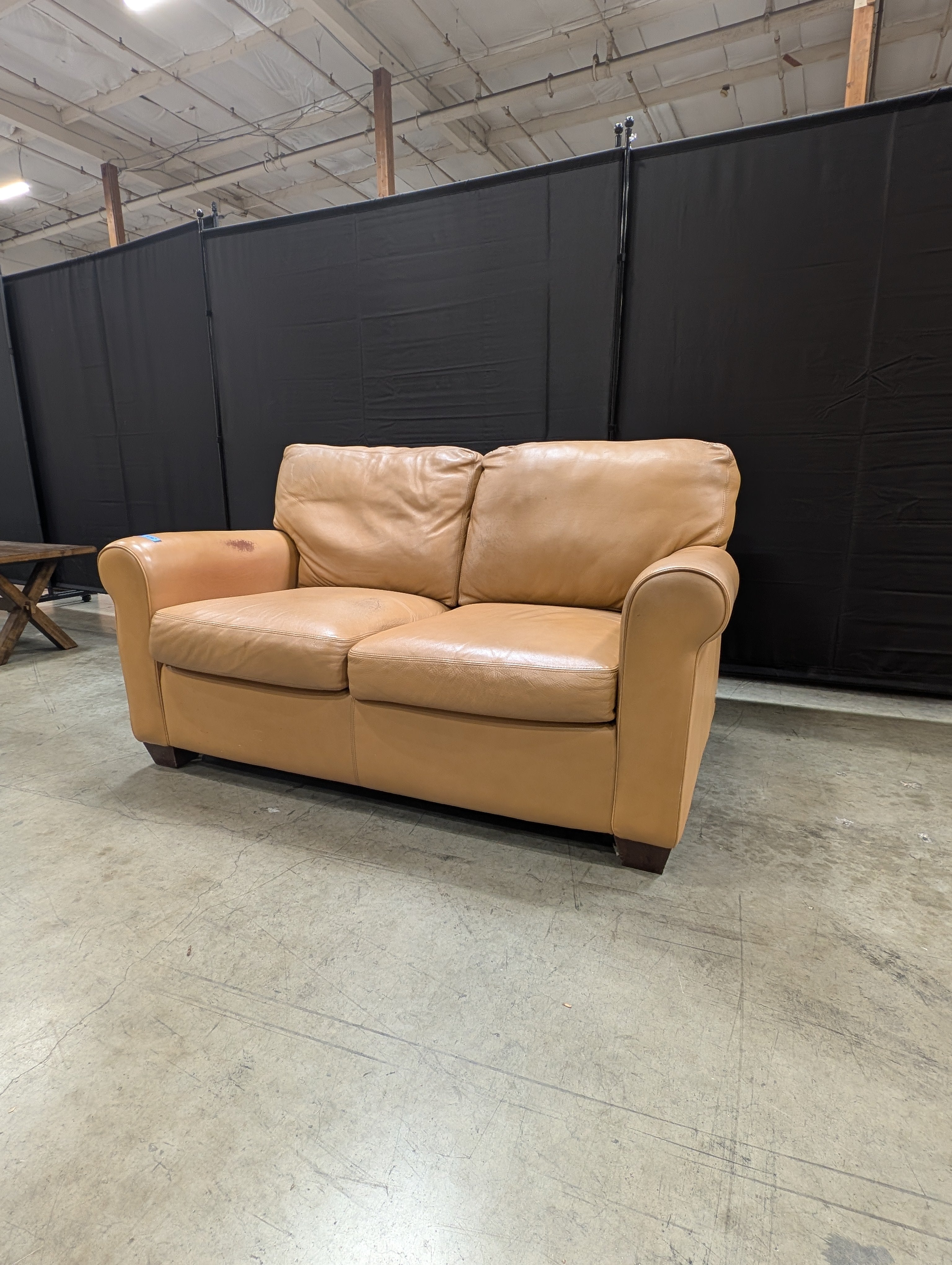 Compact Two-Seater Tan Leather Sofa