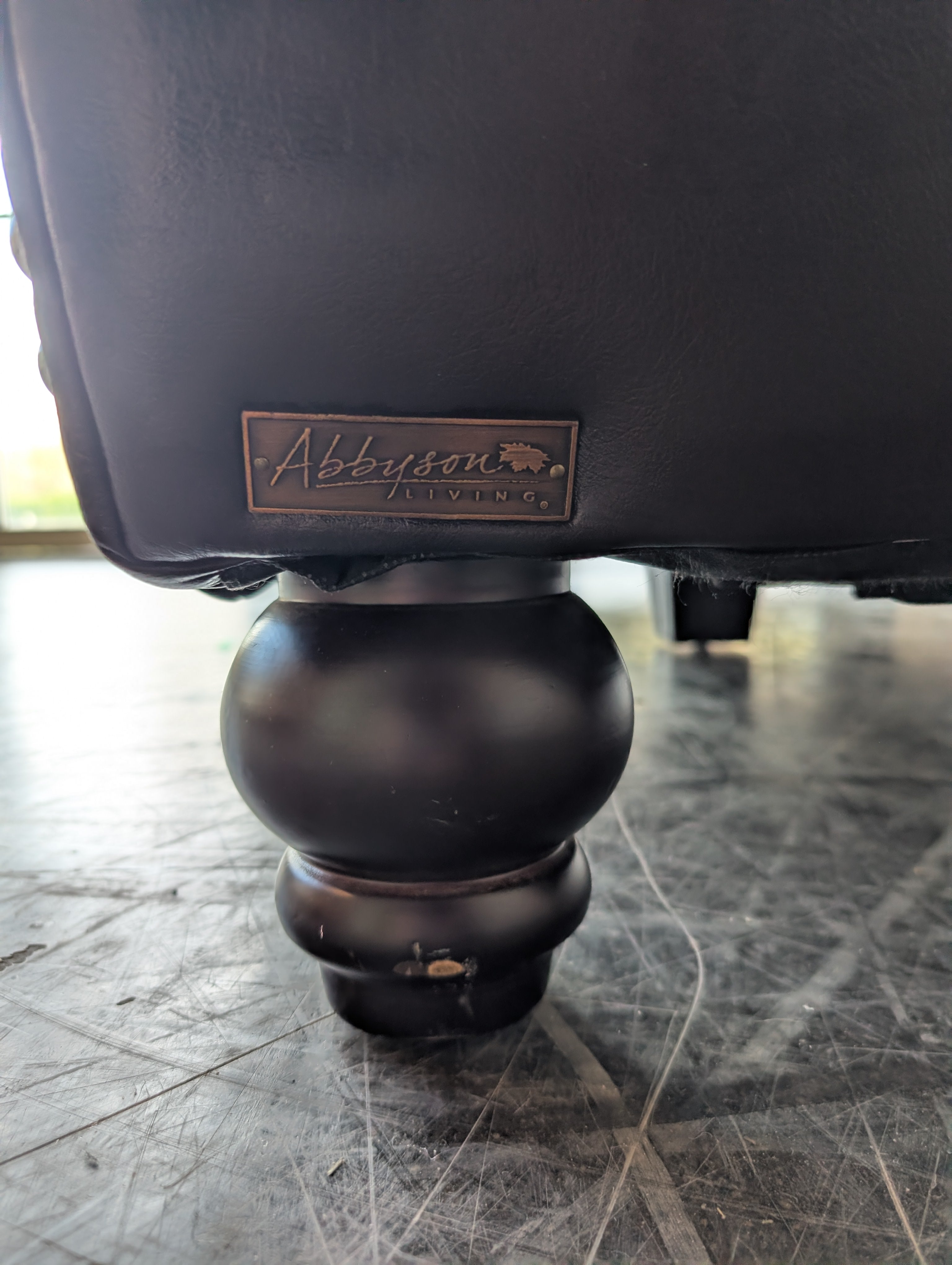 Classic Dark Brown Leather Reclining Loveseat with Nailhead Trim