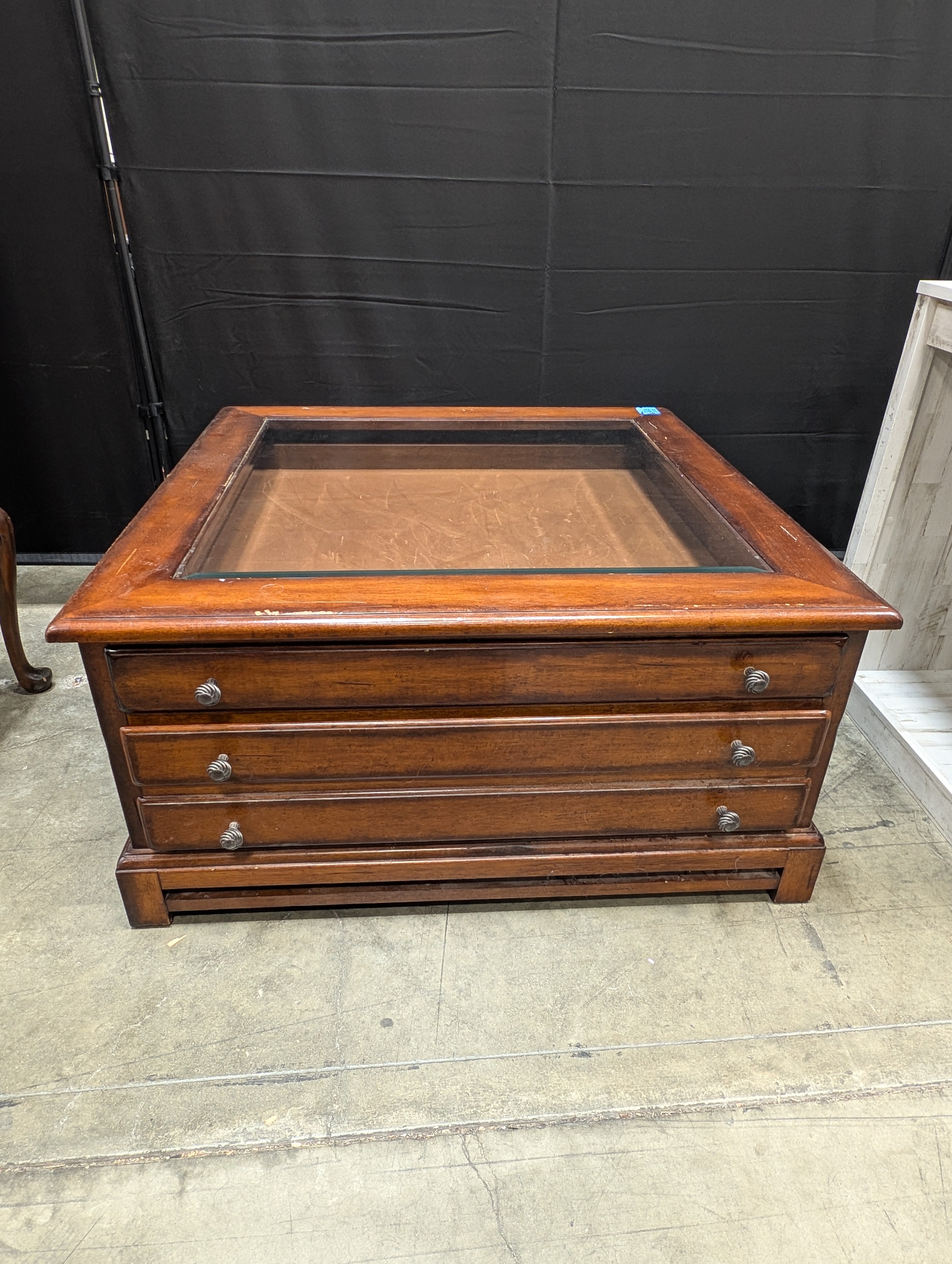 Solid Wood  Alexander Julian Glass Top Display Coffee Table with Storage Drawer