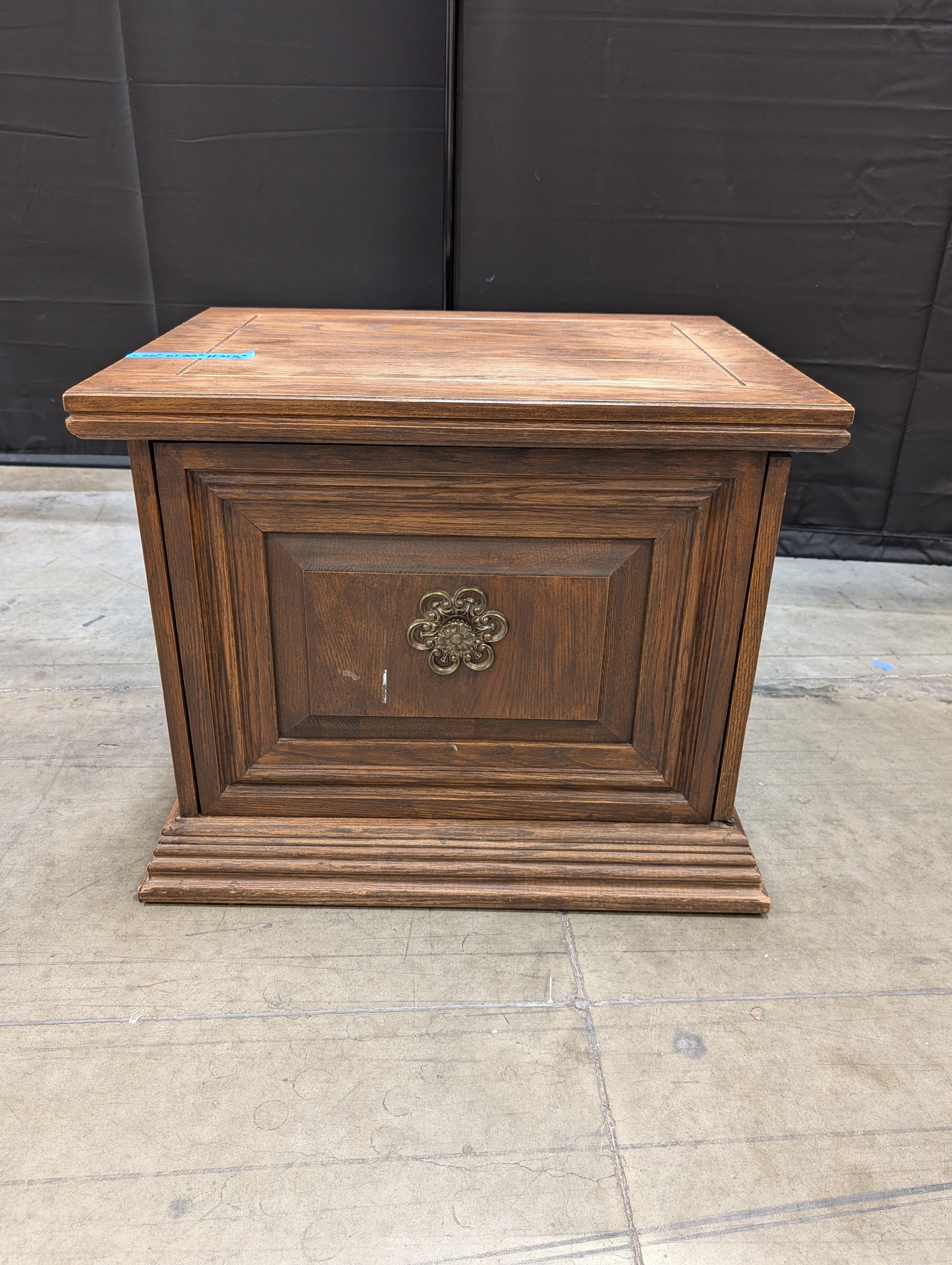 Traditional Hardwood Nightstand with Ornate Medallion Pull