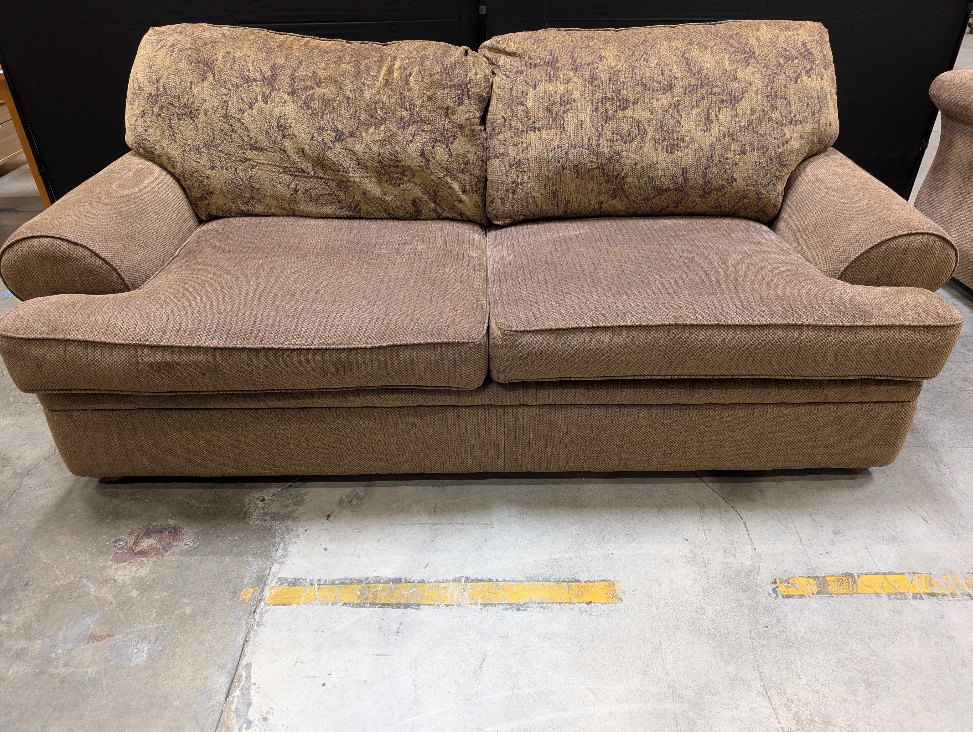 Sklar Peppler Spacious Earth-Toned Sectional Sofa with Patterned Cushions
