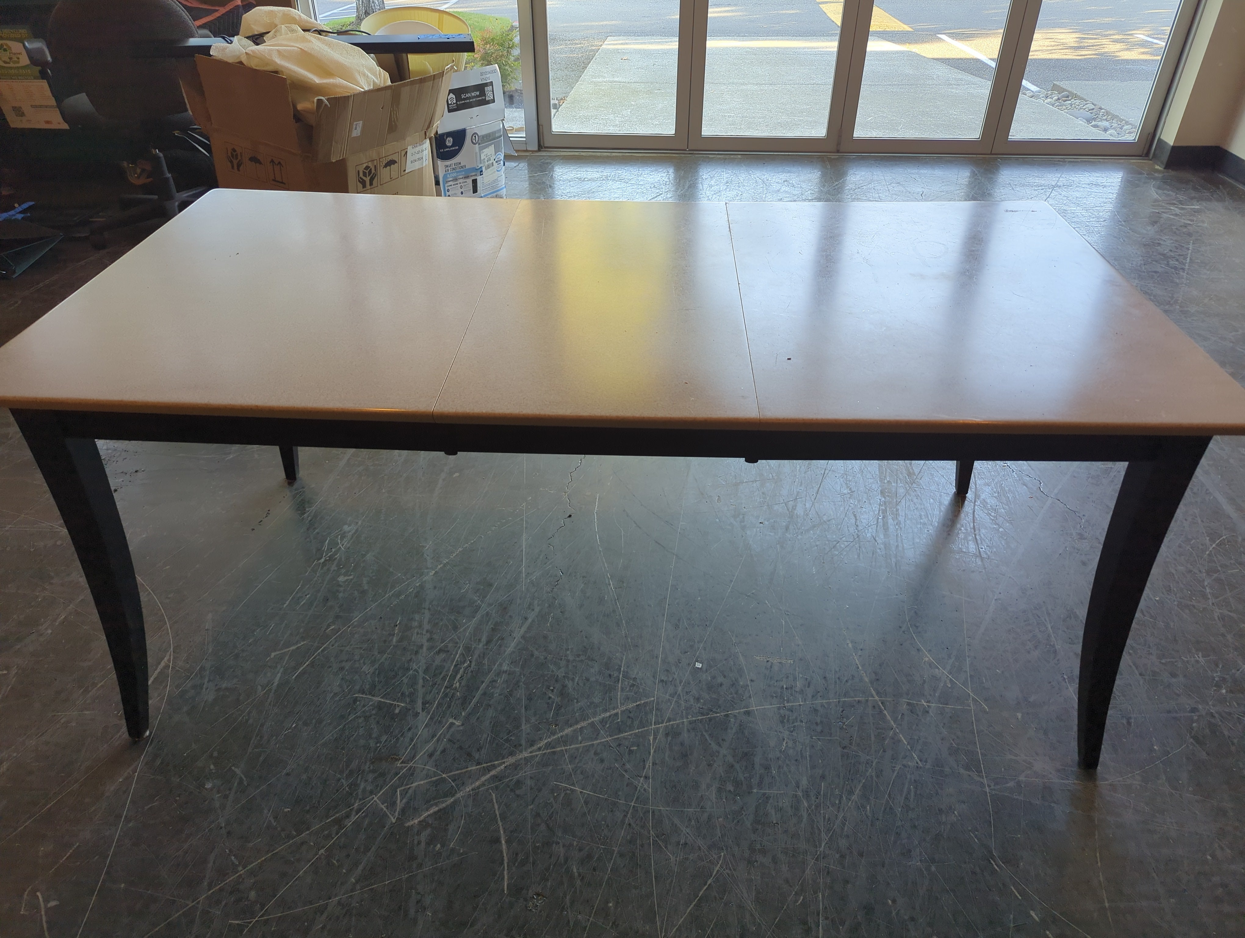 Modern Dark Wood Dining Table with Laminate Top
