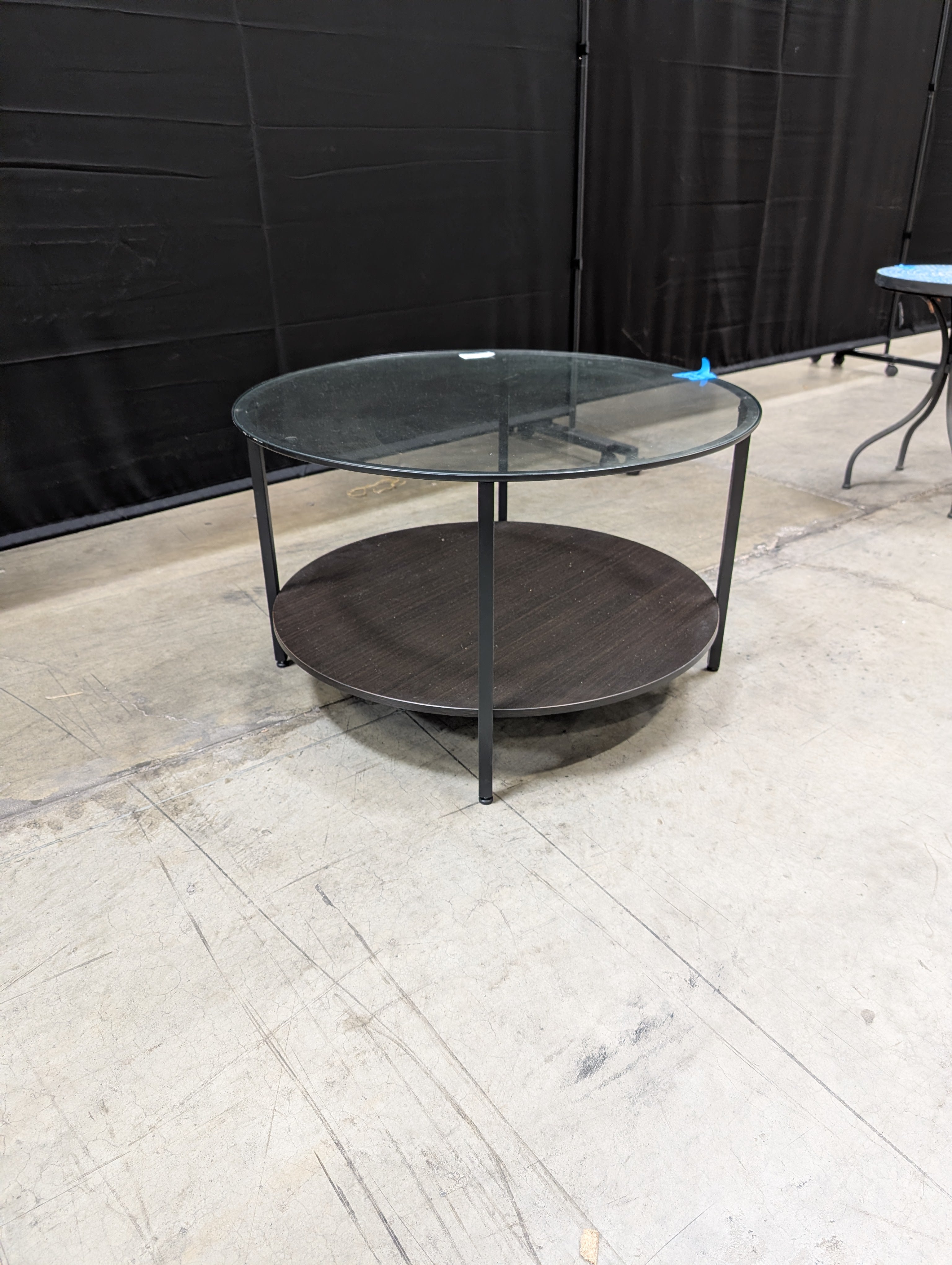 Contemporary Round Glass Top Coffee Table with Dark Wood Base