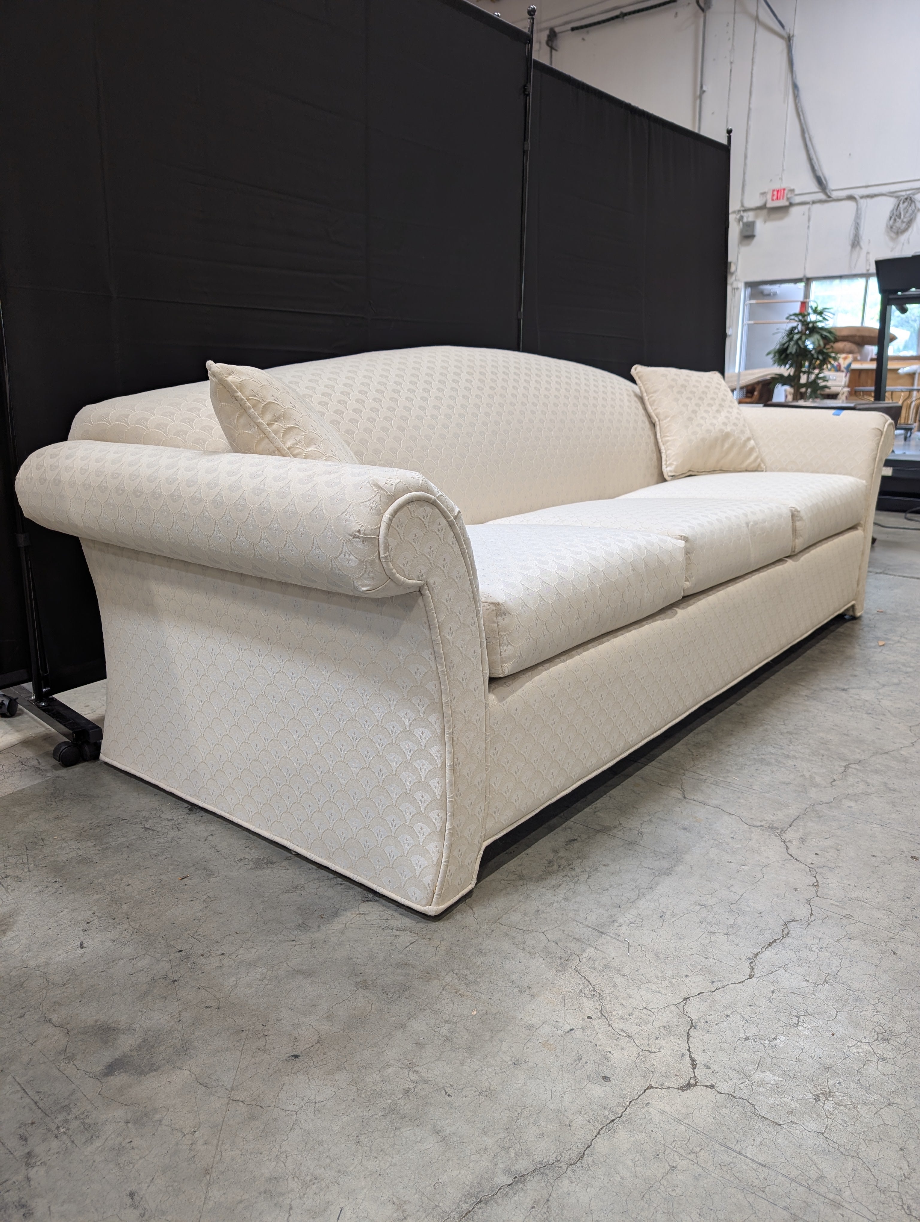 Cream Patterned Upholstered Sofa with Rolled Arms