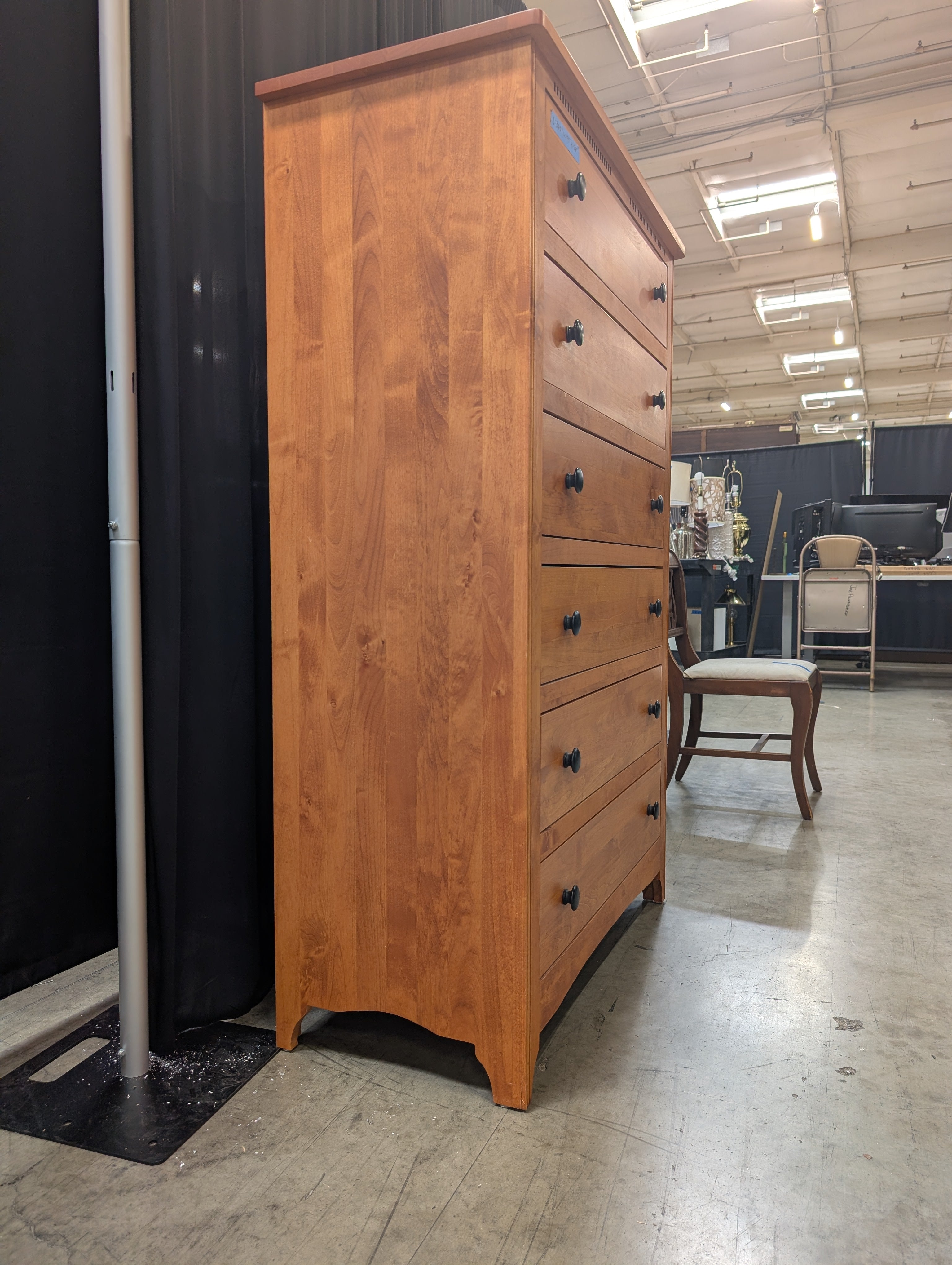 Warm Honey Wood Six-Drawer Dresser with Dark Knobs