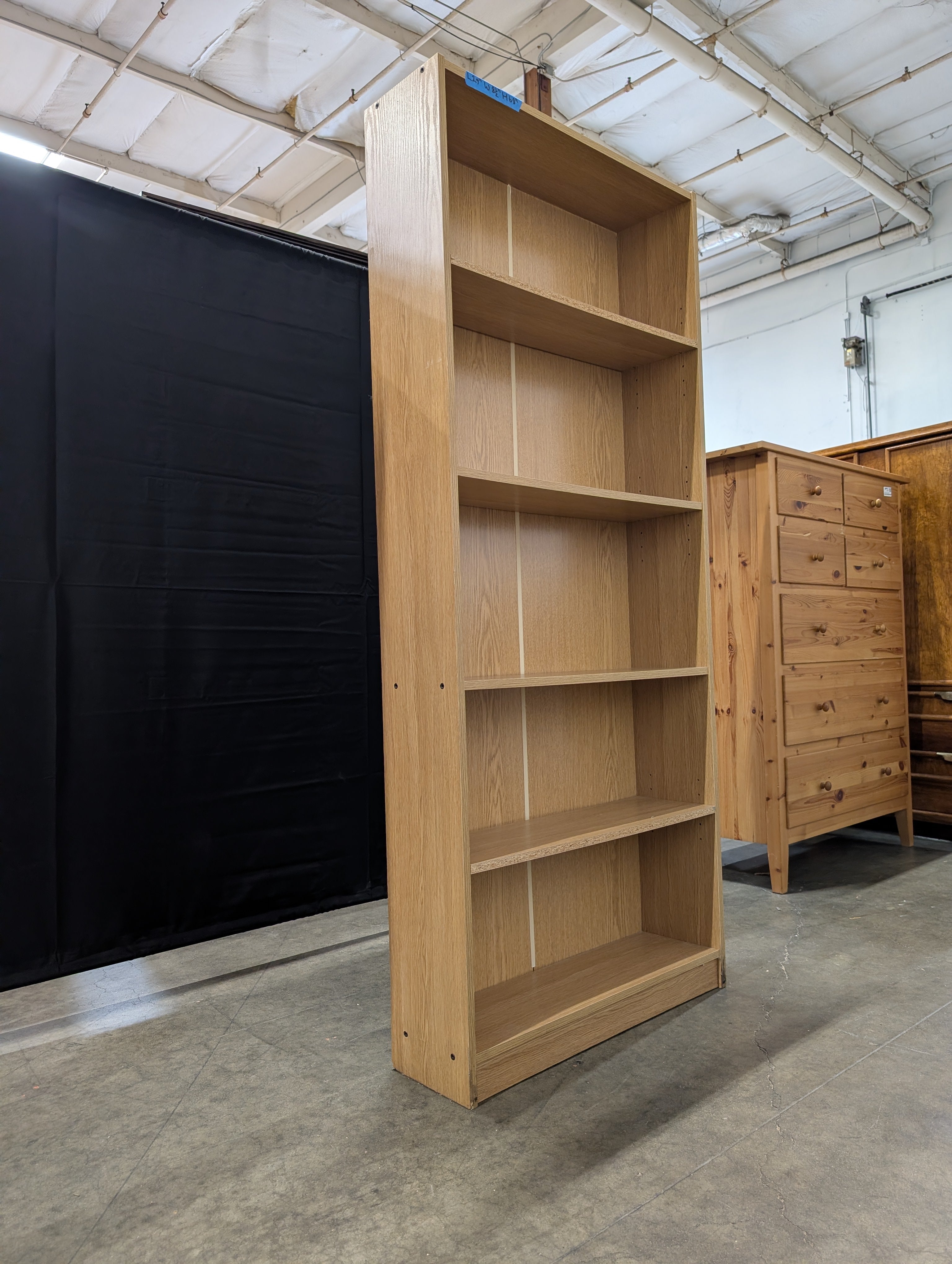 Versatile Light Wood Tone Bookcase with Adjustable Shelves