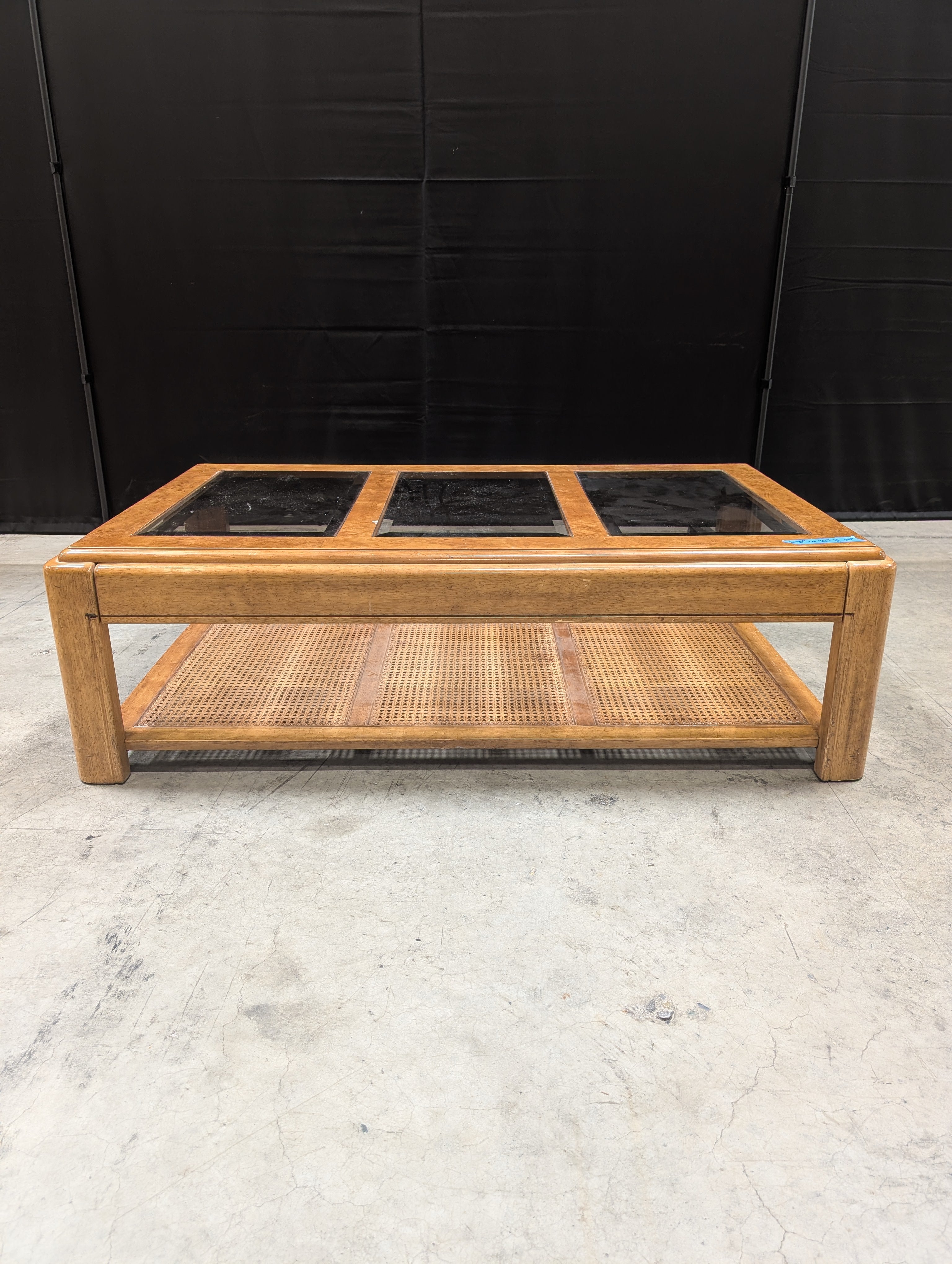 Vintage Style Burled Wood Coffee Table with Glass Top and Cane Accents