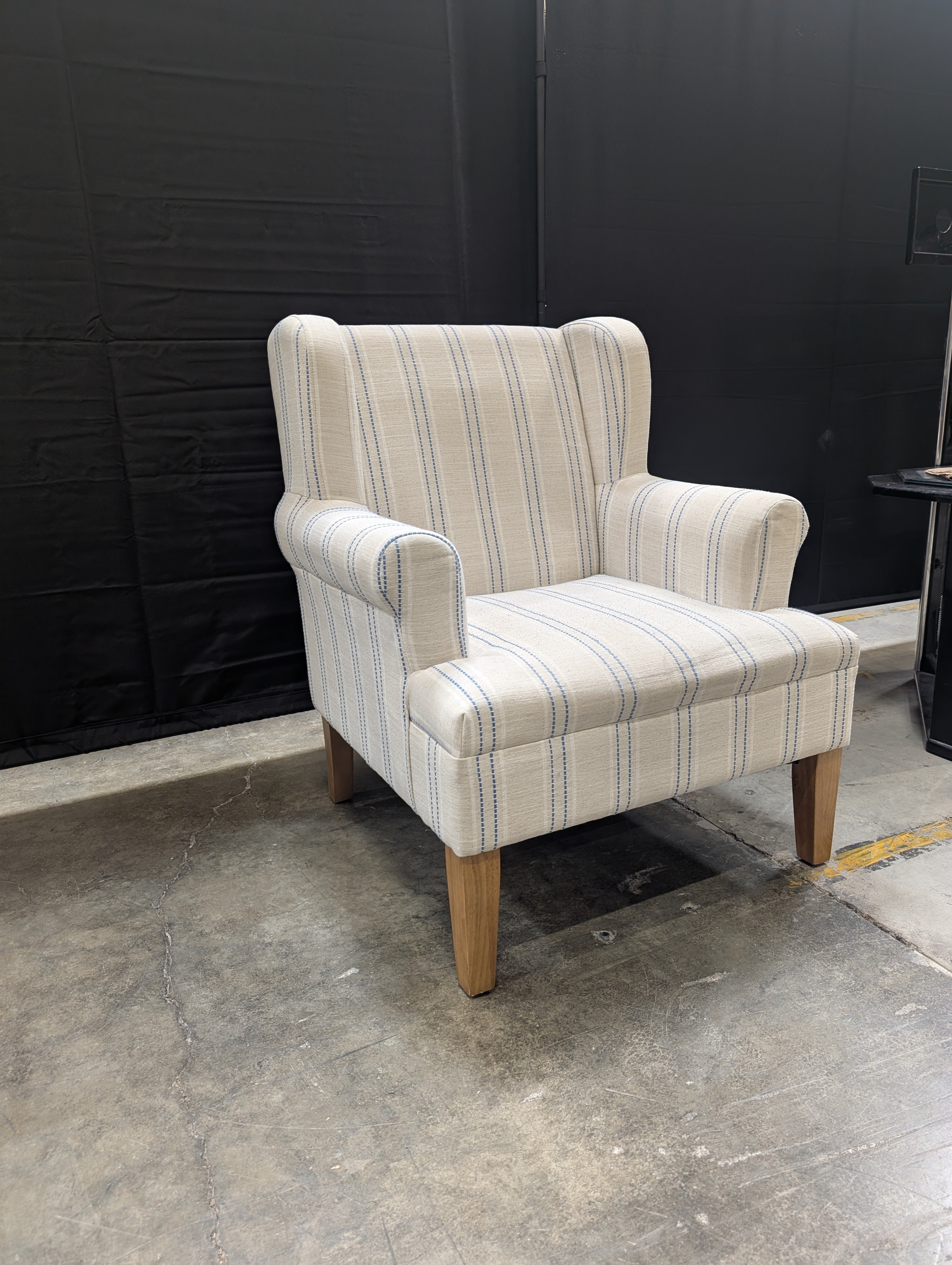 Upholstered Wingback Armchair with Blue Stripes