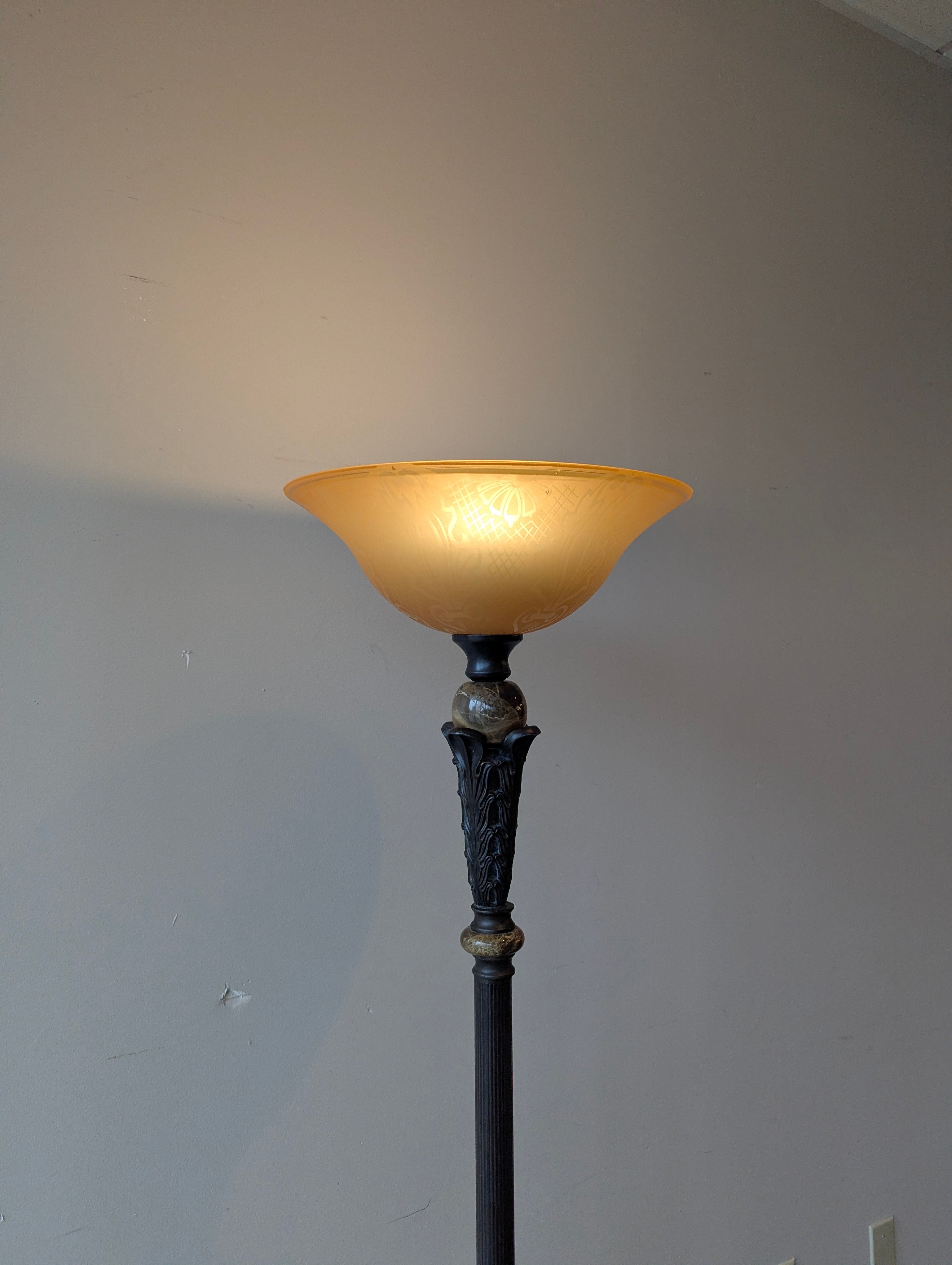 Ornate Dark Metal Torchiere Floor Lamp with Amber Mottled Shade