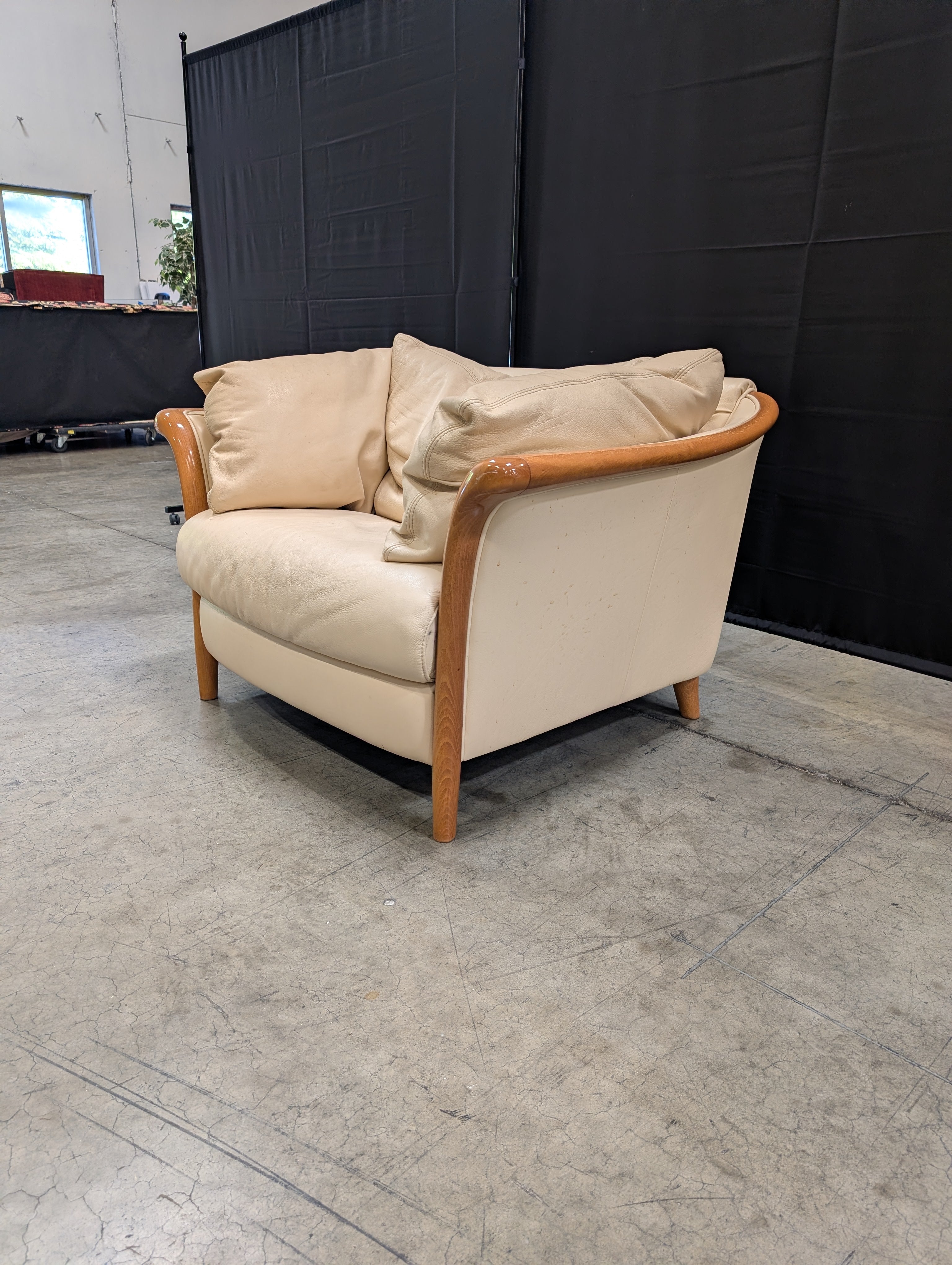 Beige leather Chair with Exposed Wood Frame