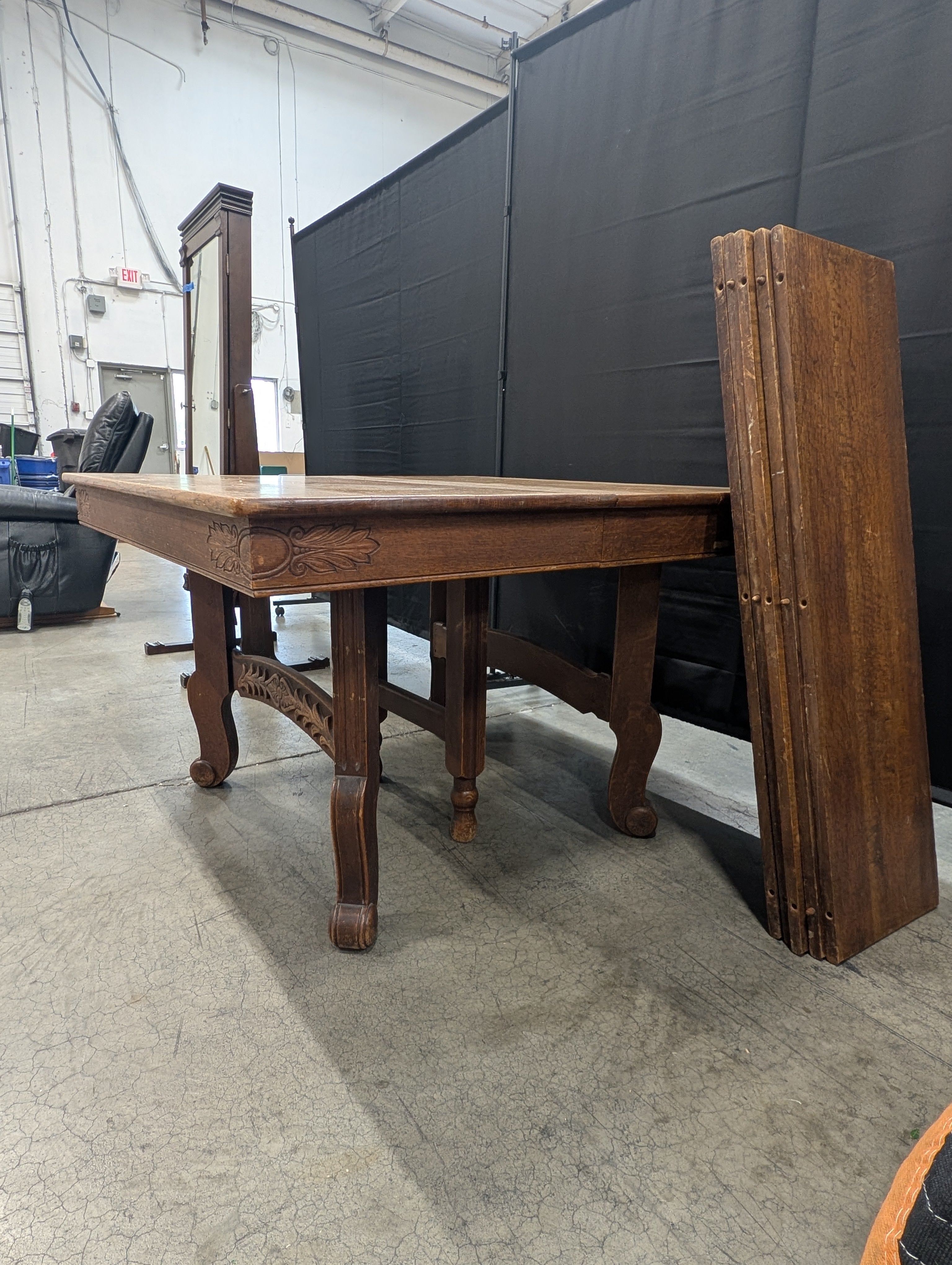 P. E. Routier Furniture Co. Carved Wood Extendable Dining Table