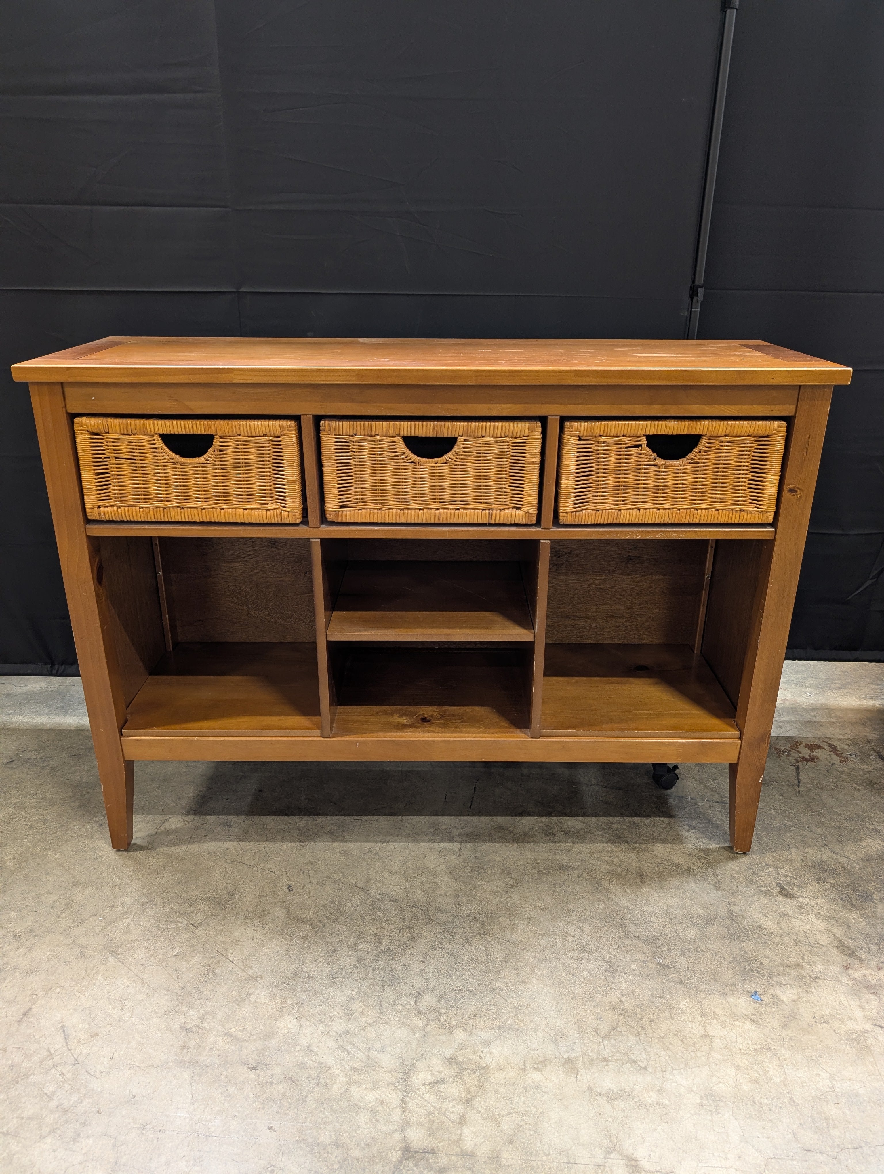 Wooden Console Table with Wicker Baskets and Open Shelves