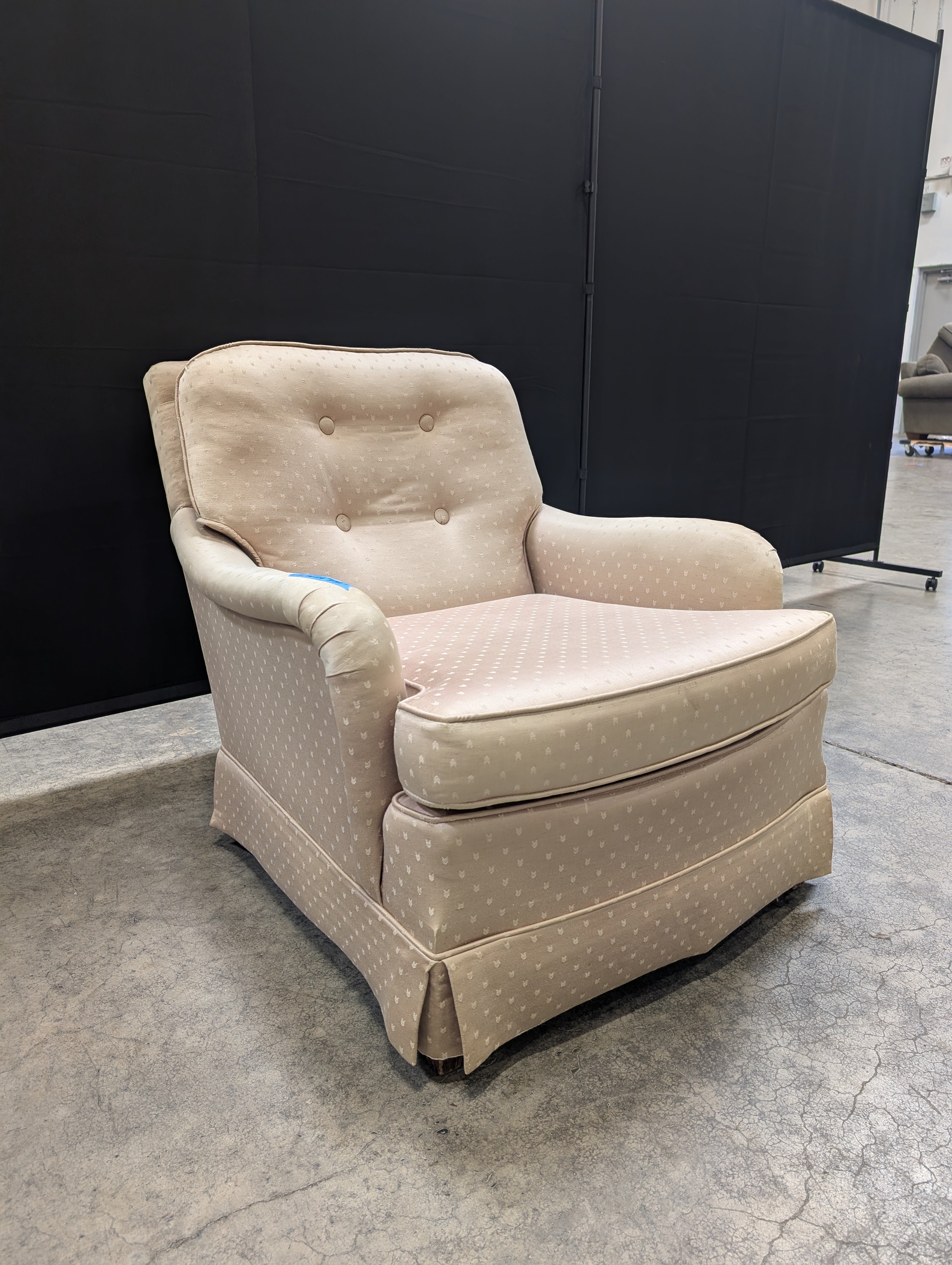 Classic Beige Upholstered Armchair with Dotted Fabric