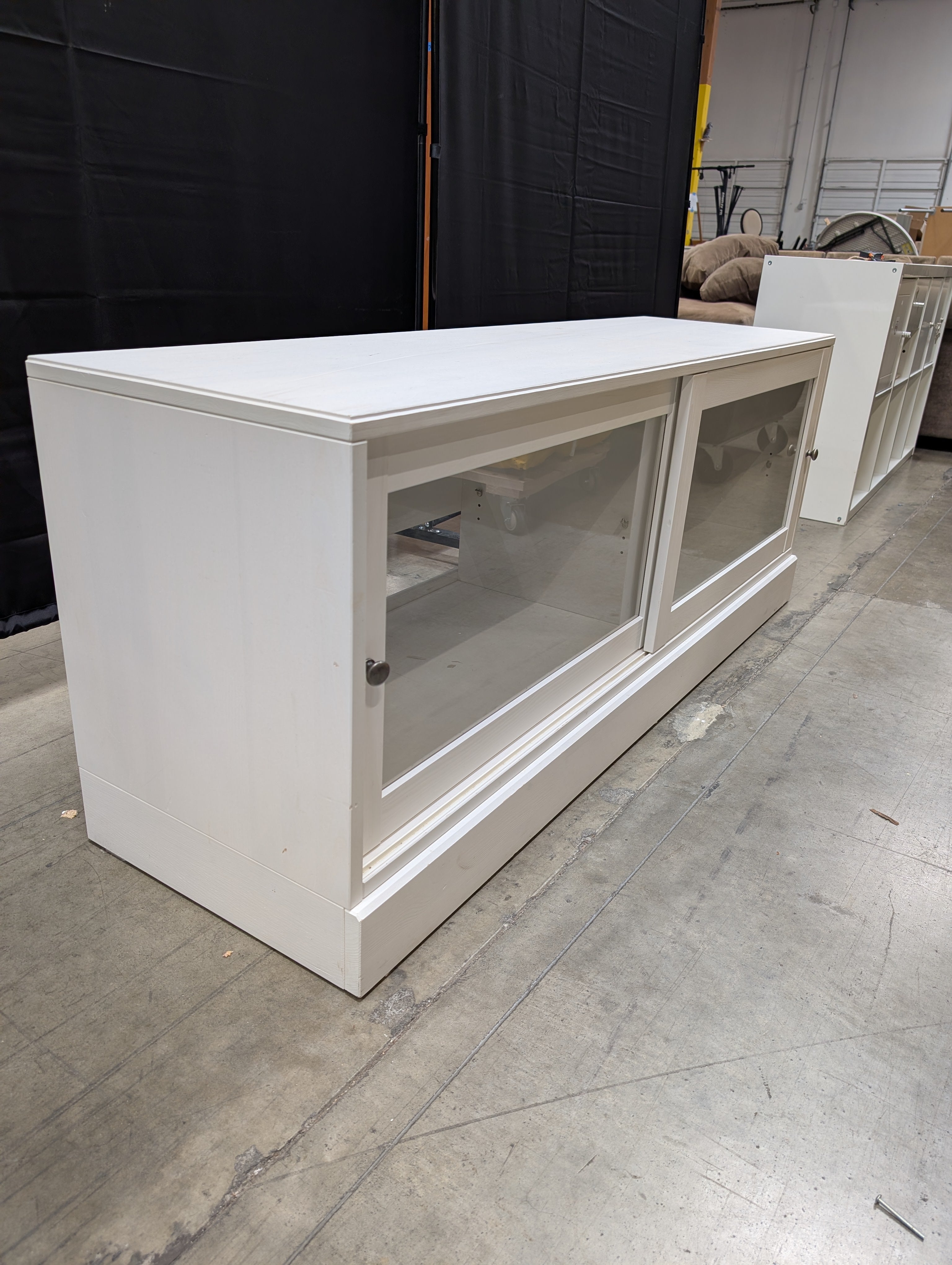 White Media Console with Sliding Glass Door