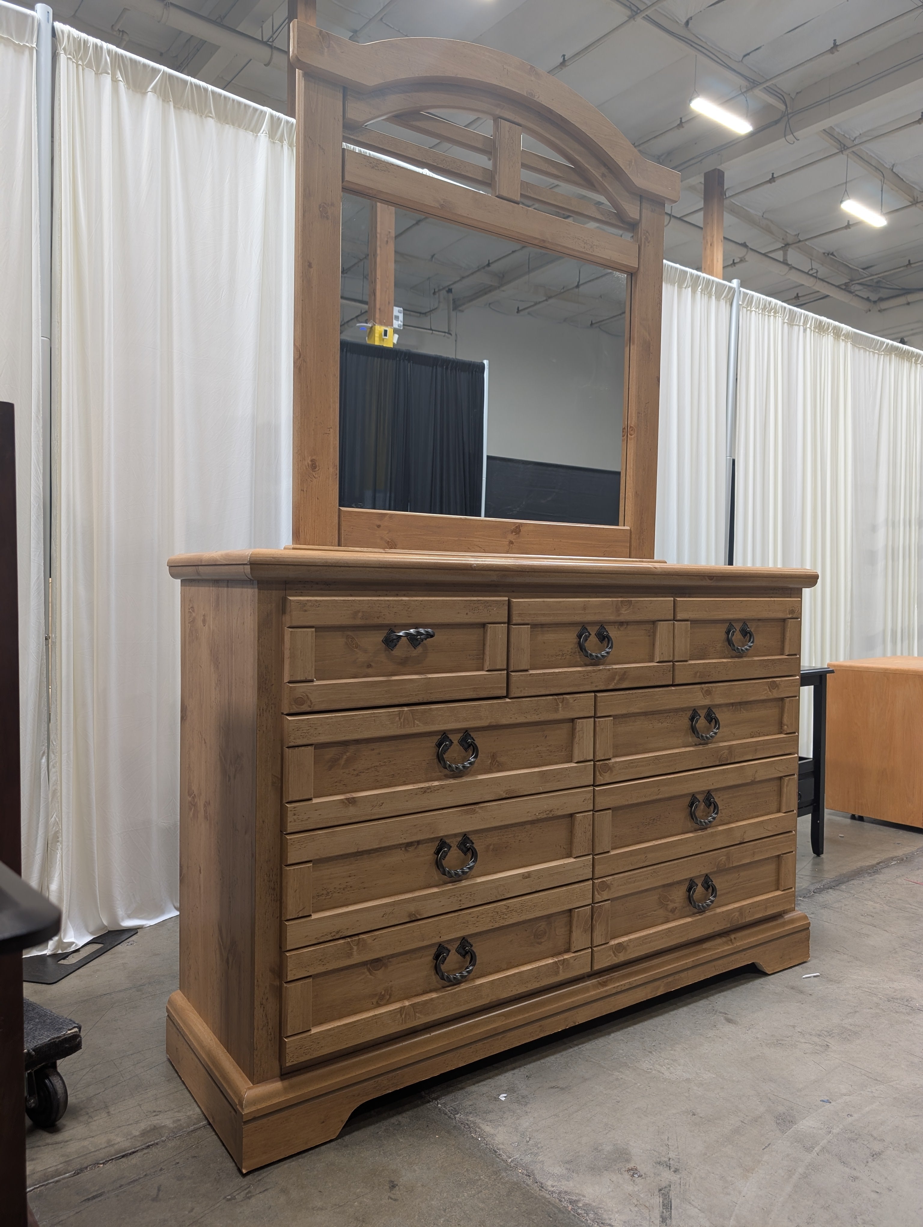 Rustic Light Wood 8-Drawer Dresser with Arched Mirror
