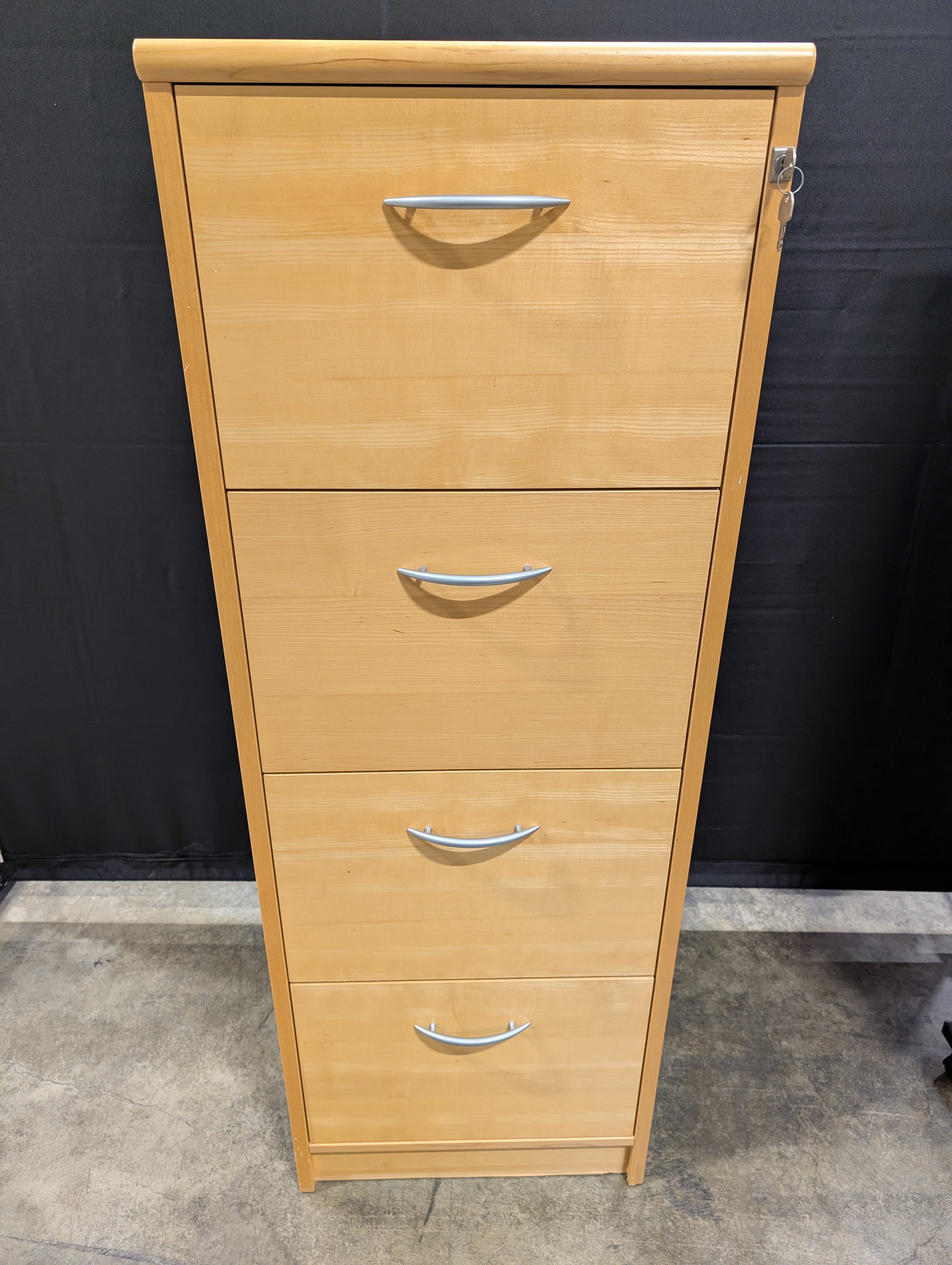 Versatile Blonde Wood Three-Drawer Storage Cabinet