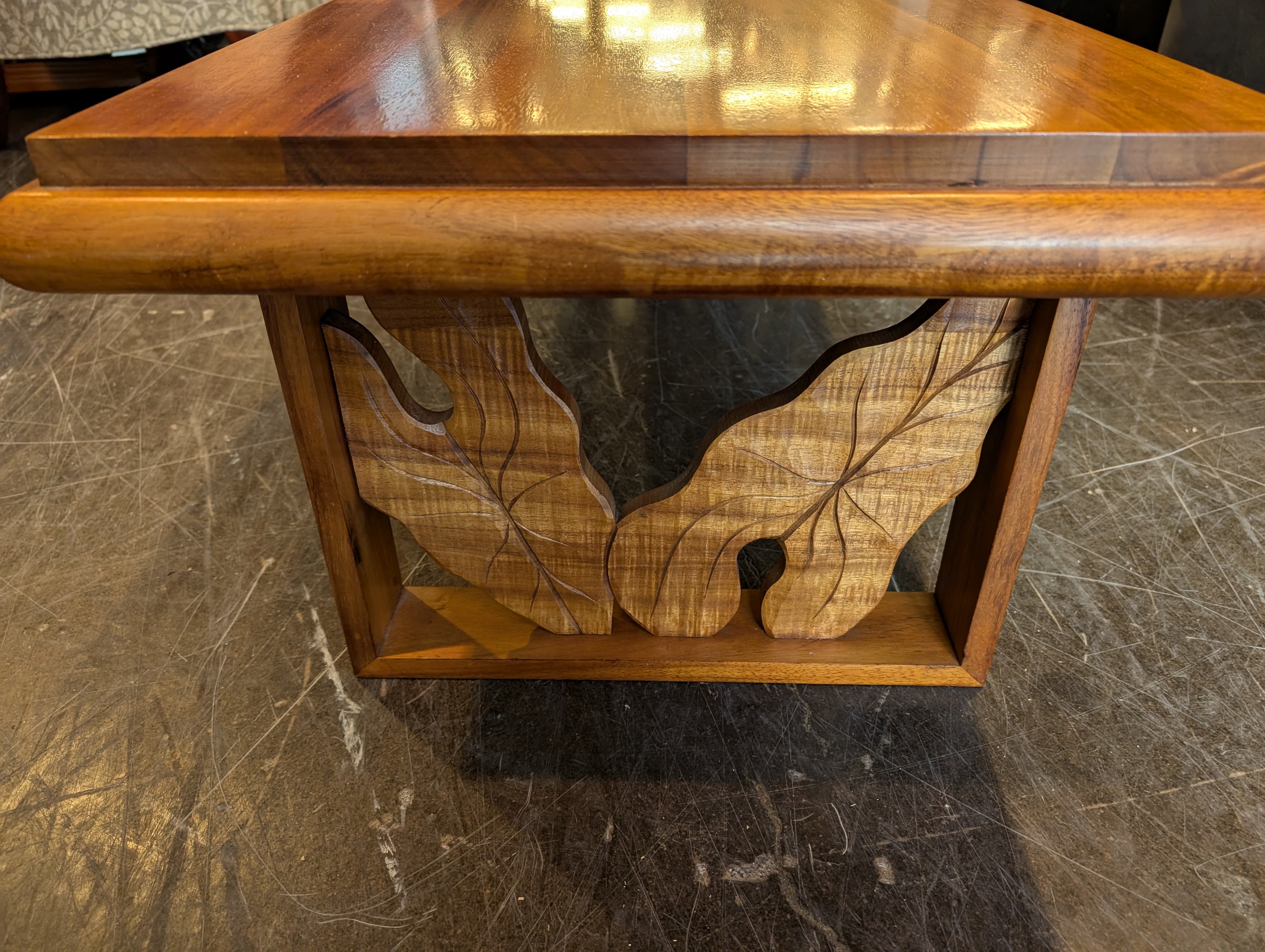 Rich Brown Hardwood Coffee Table with Carved Detail
