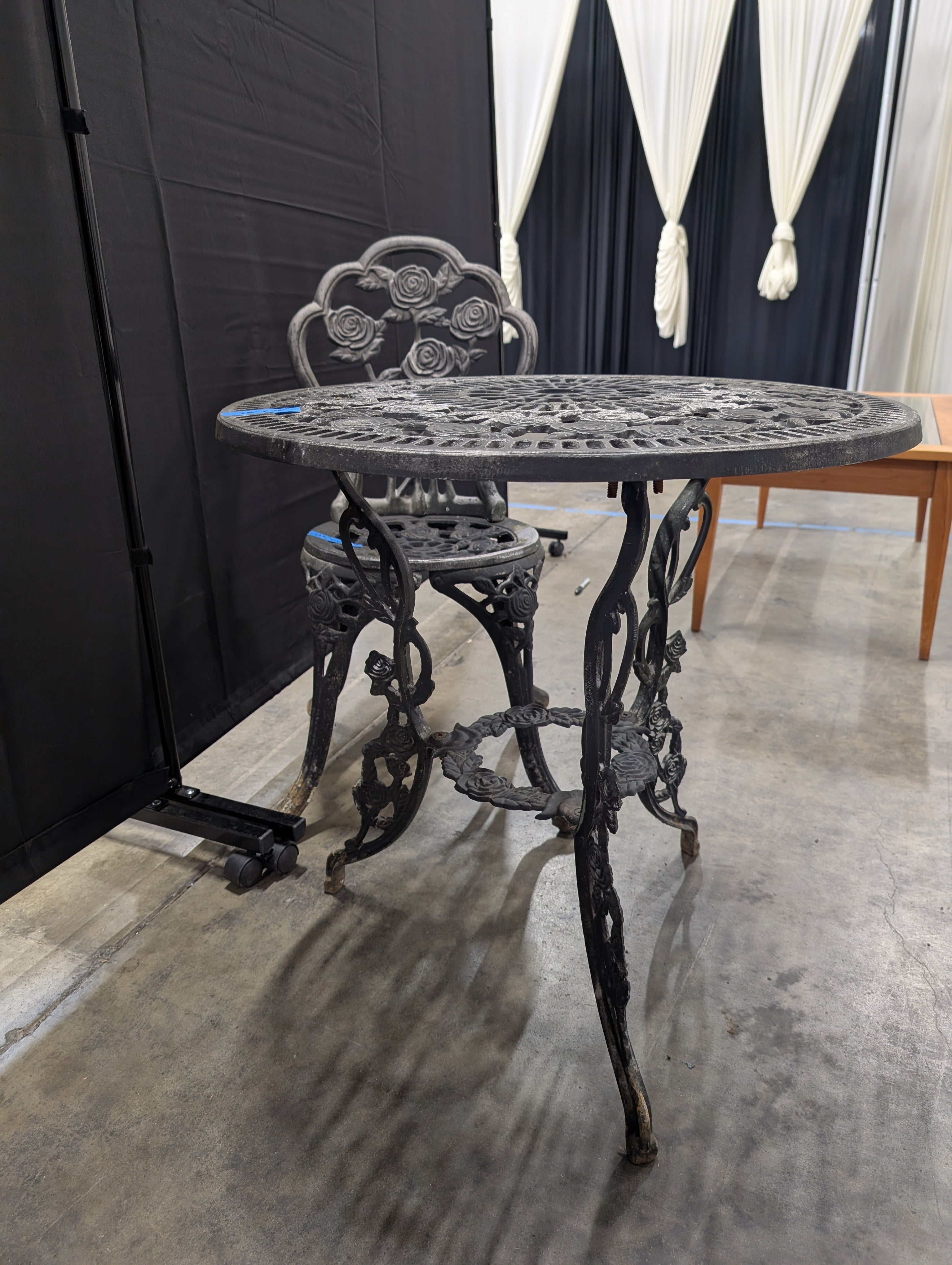 Round Black Cast Iron End Table with Floral Pattern