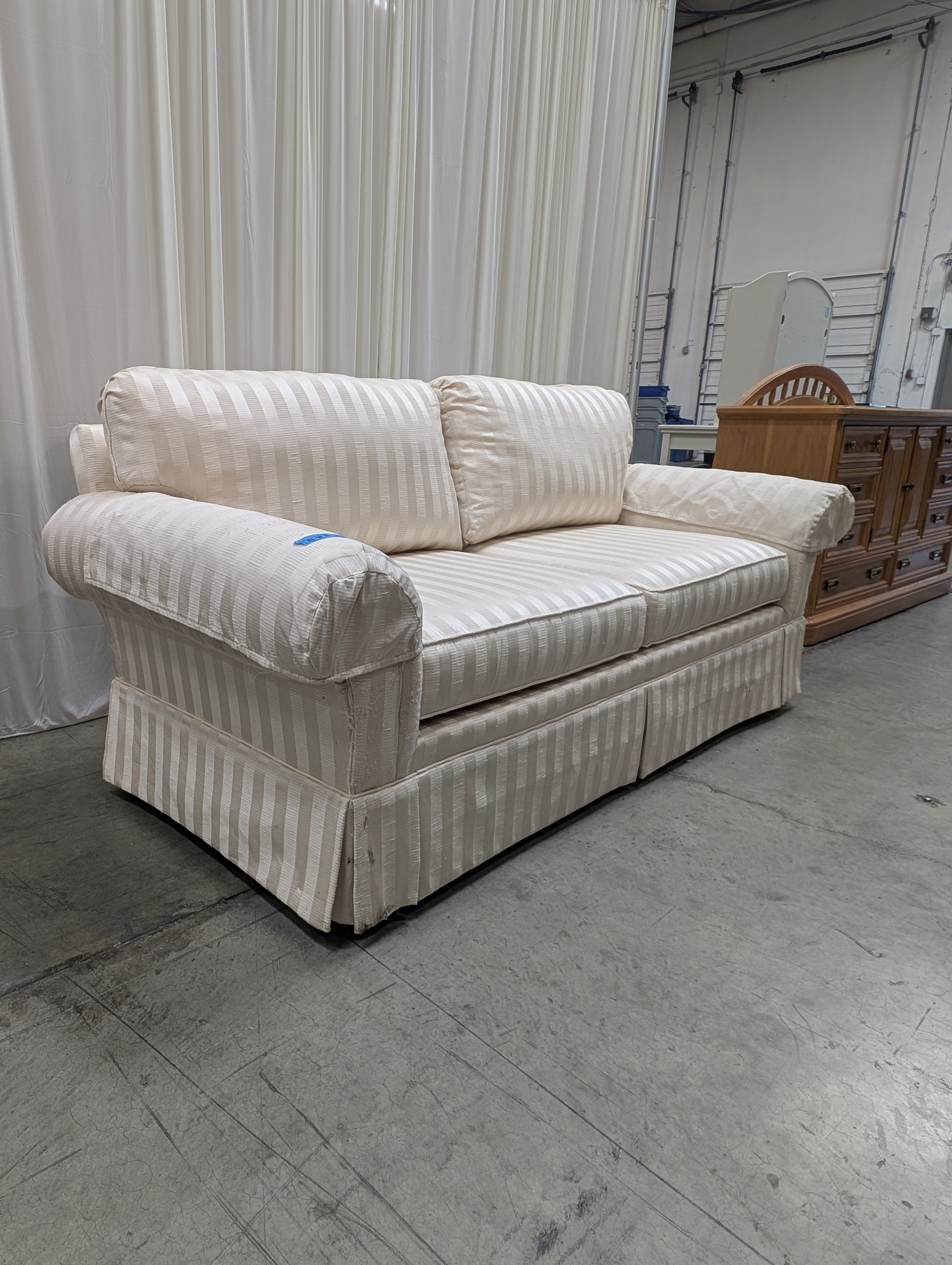 Woodmark Cream Striped Couch with Rolled Arms