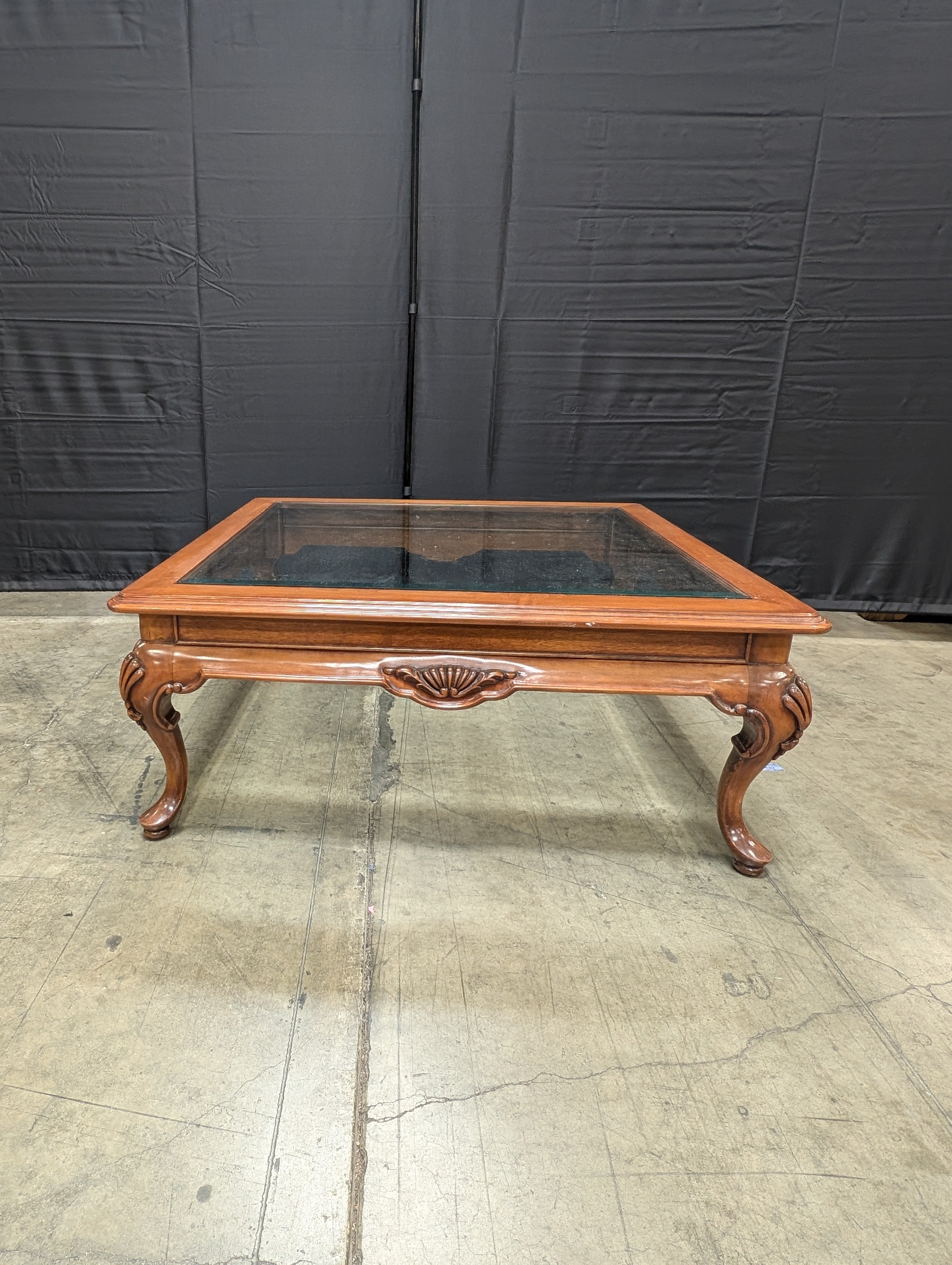 Traditional Carved Wood and Glass Top Coffee Table