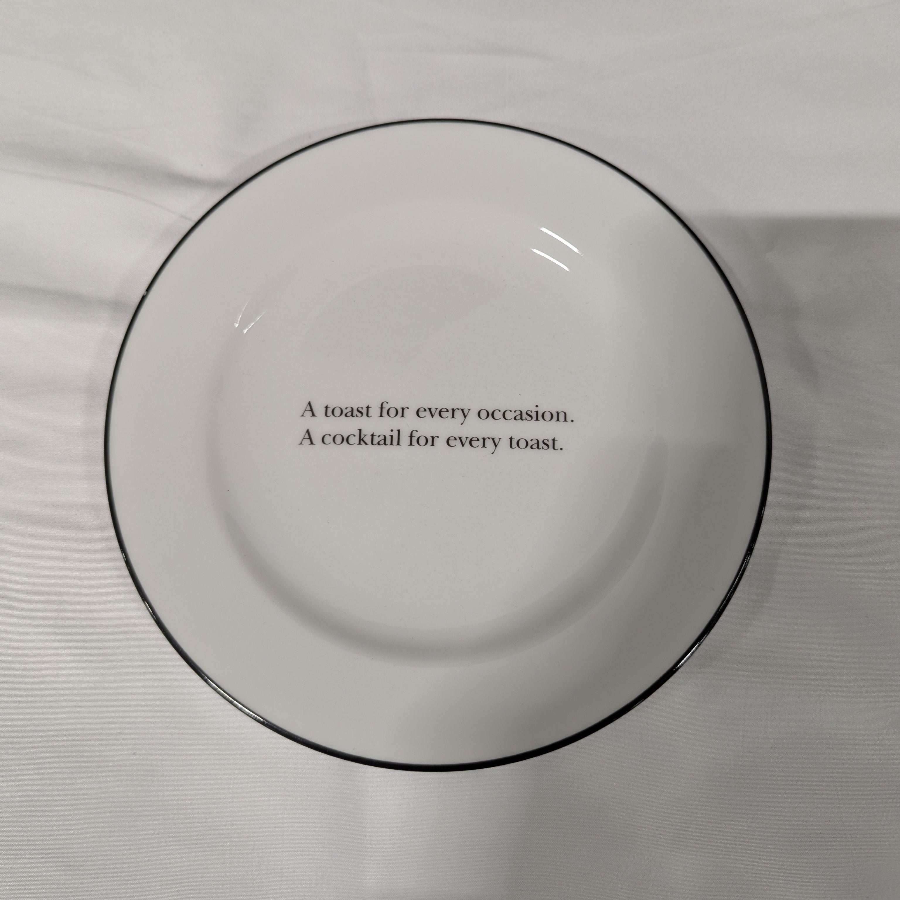 Whimsical White Ceramic Plate with Cocktail Quote Black Rim